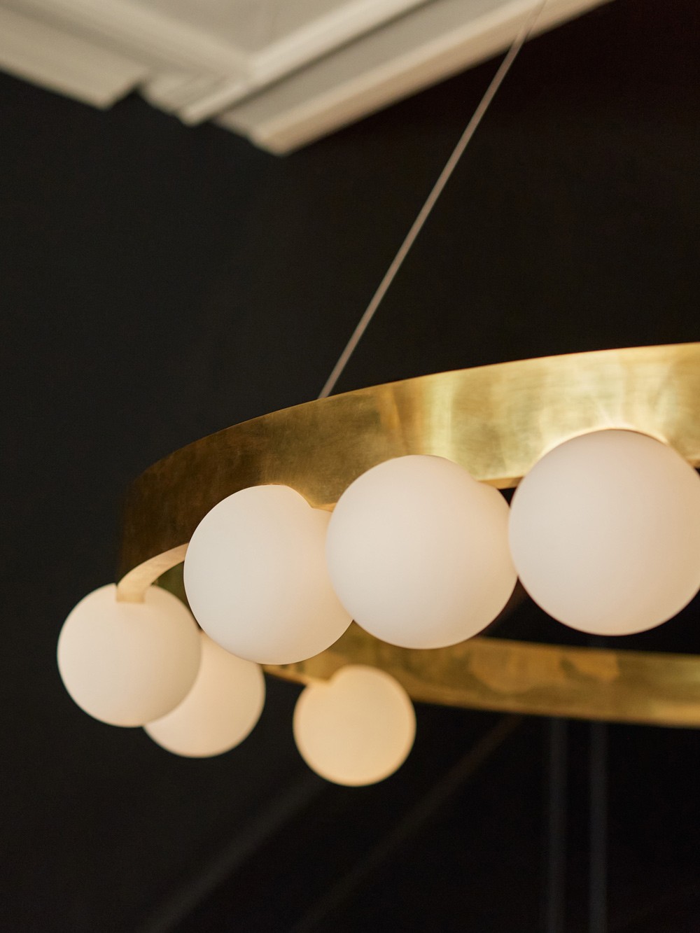 Cami chandelier – brass ring with frosted glass globes for soft ambient lighting