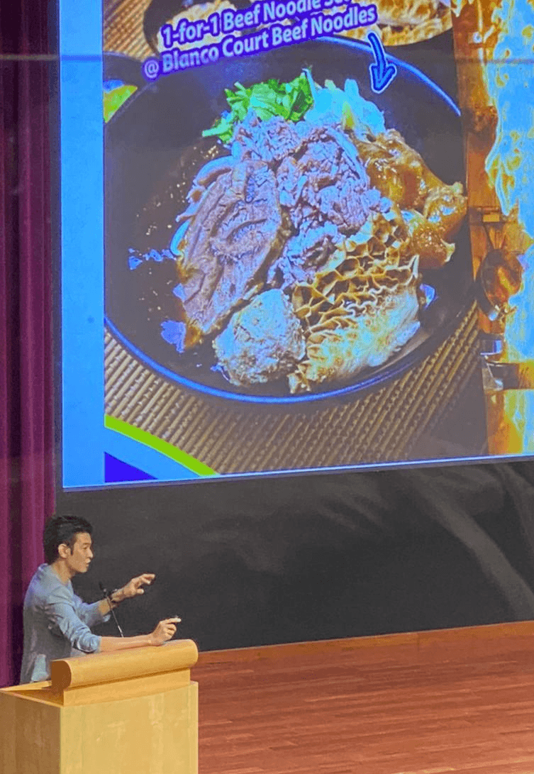 Close-up of a tree stump showing growth rings and a textured brown wood surface.