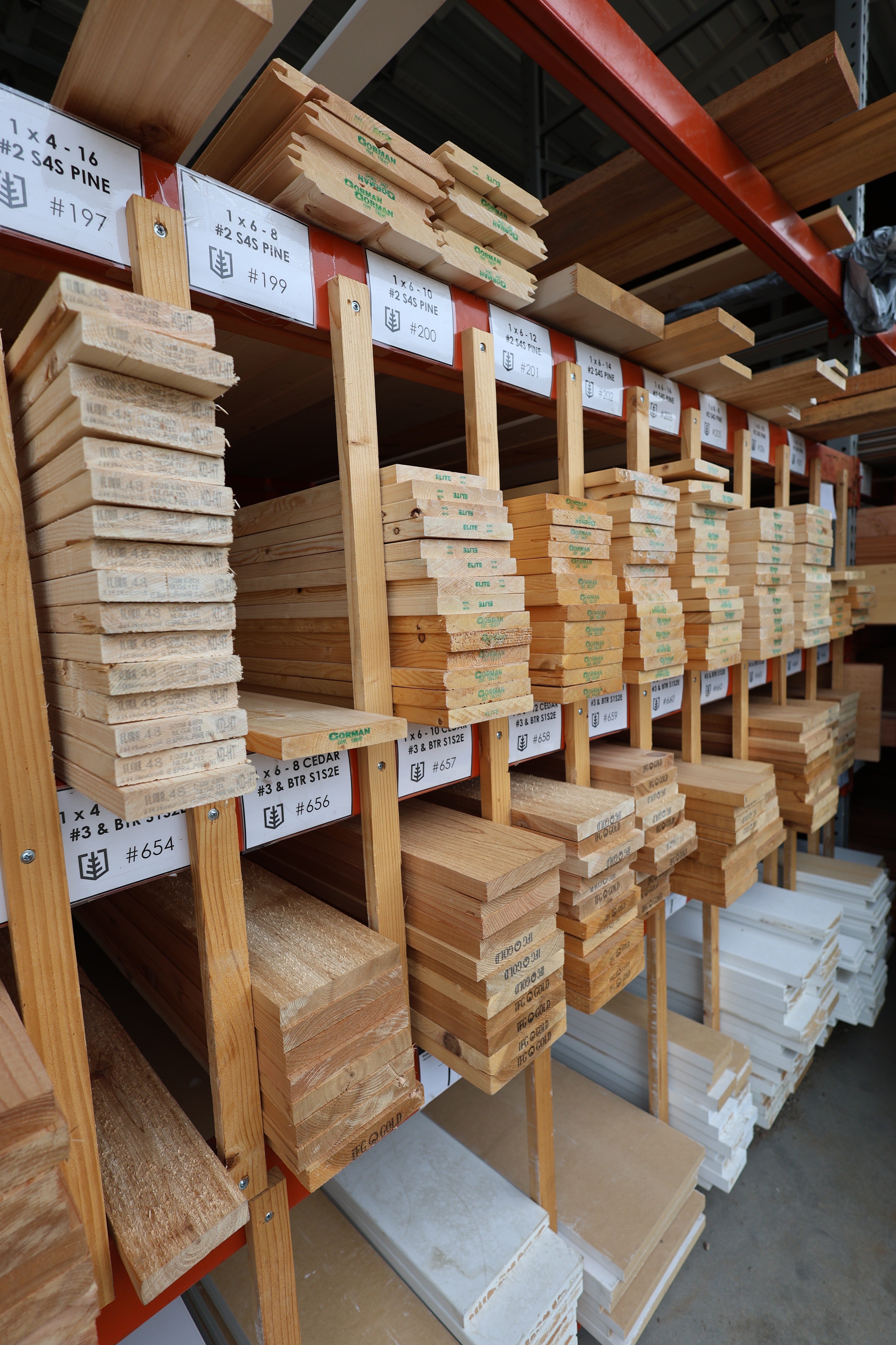 Macro photograph of light, textured wool fabric with soft shadows highlighting the natural fibers.