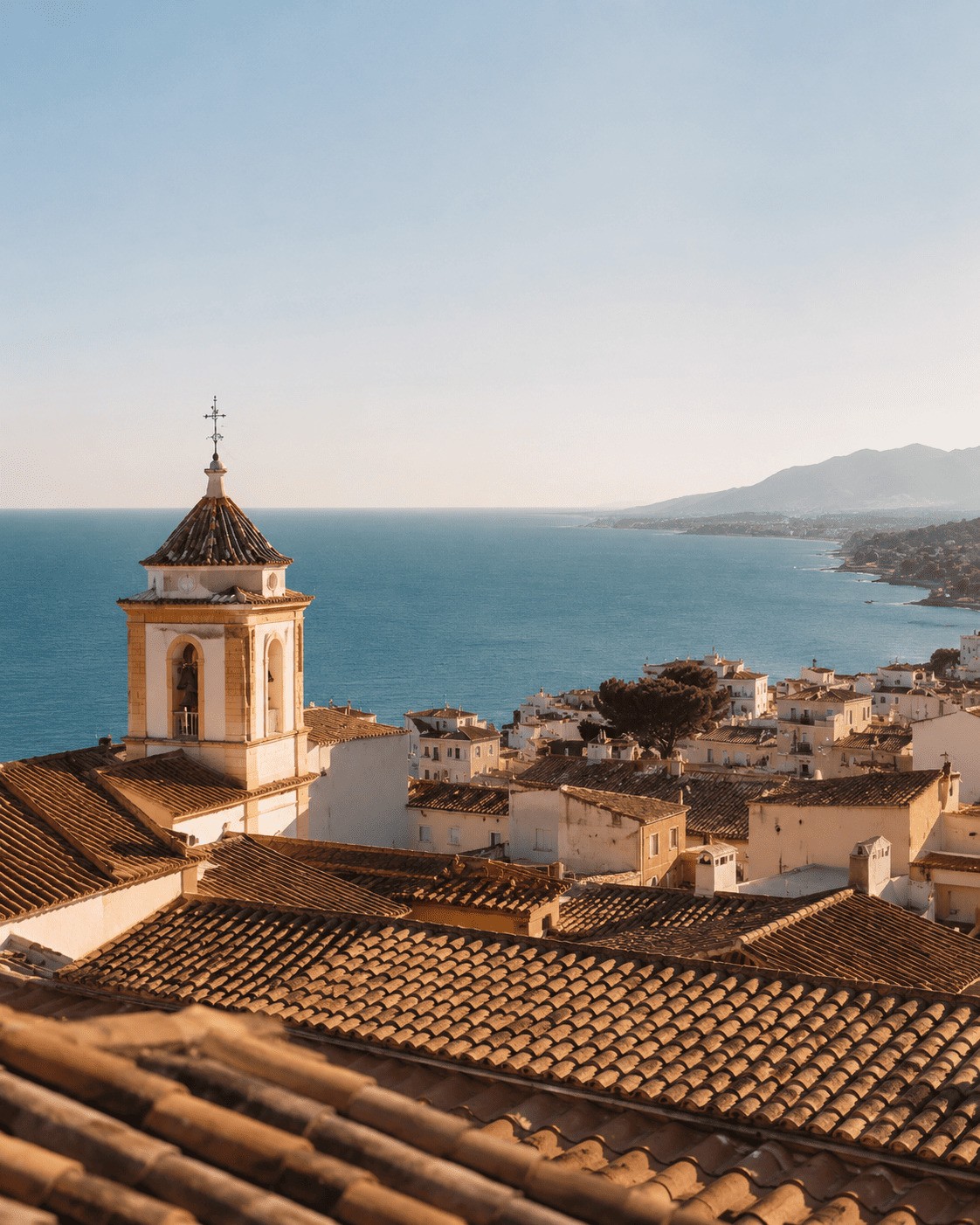 Historic seaside town near Barcelona featuring charming white houses and scenic ocean coast views, representing idyllic coastal living in Maresme.