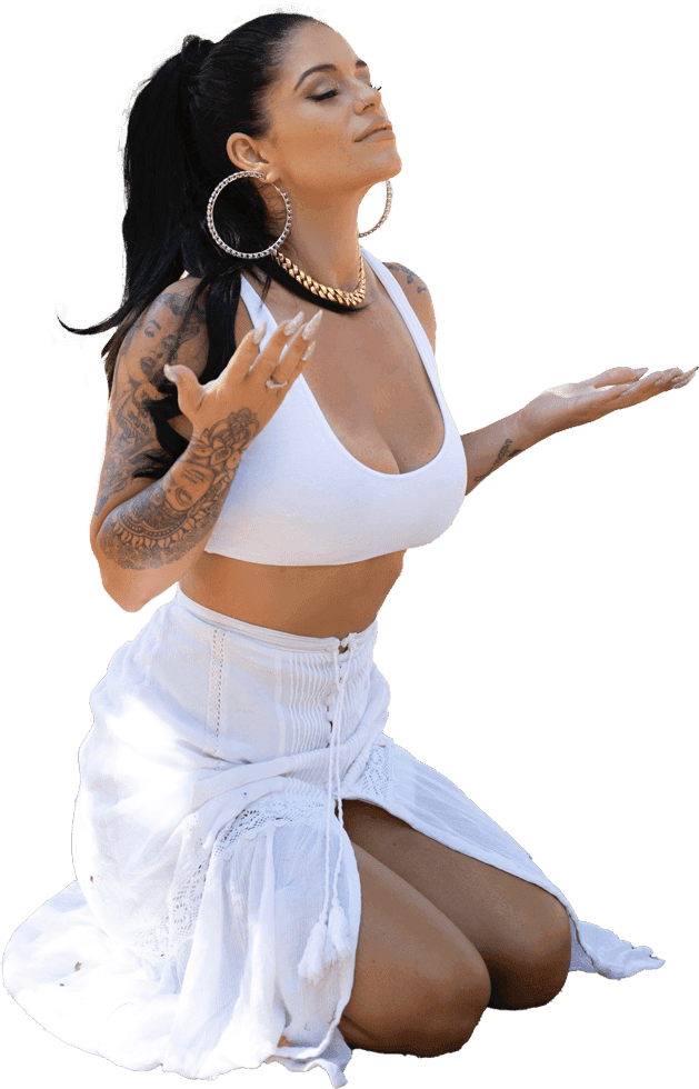 “Gayle Fuller kneeling in meditation with open arms, dressed in white, embodying spiritual surrender, divine connection, and energetic alignment”