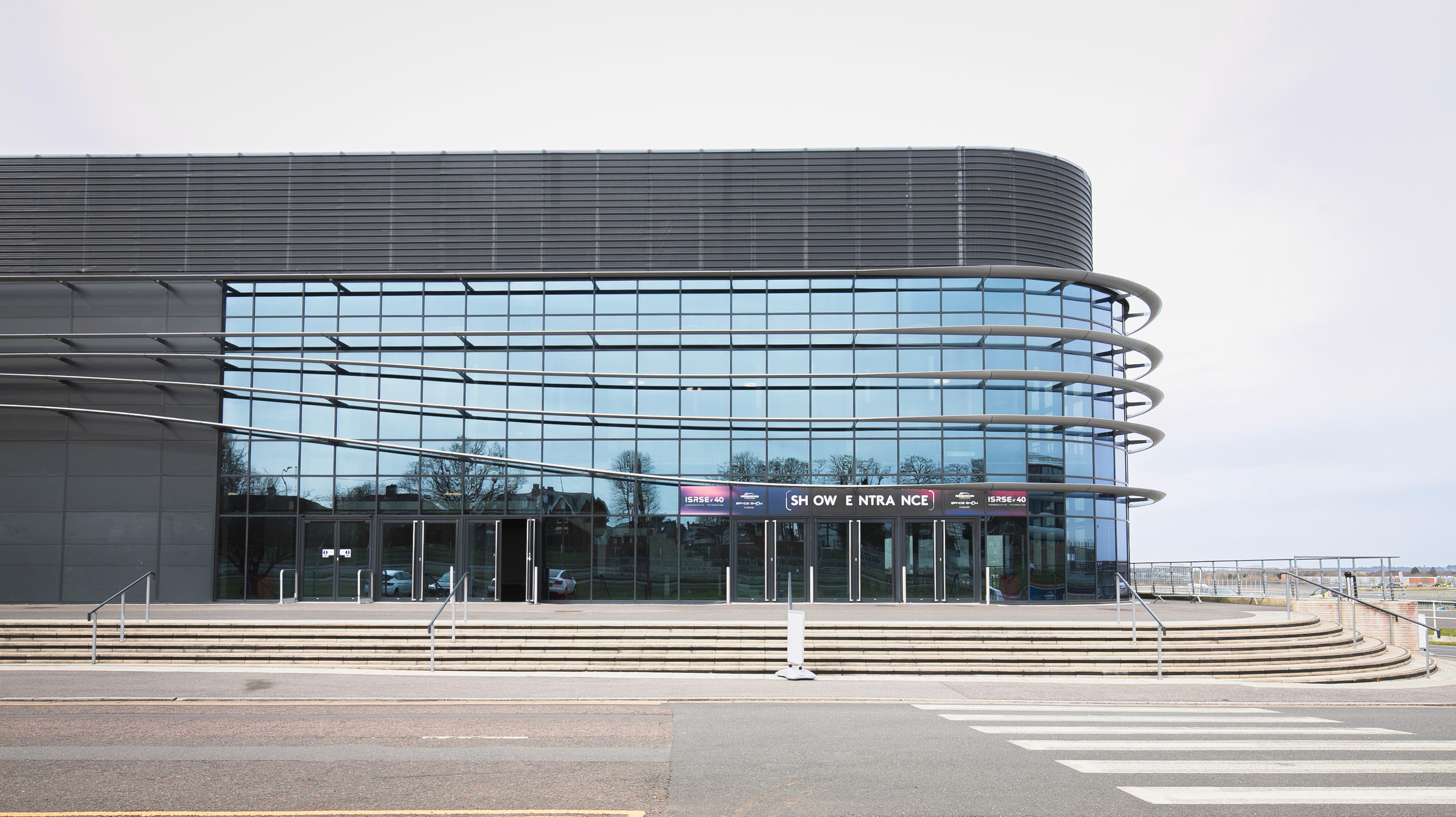 Man and two girls taking a selfie in a tent
