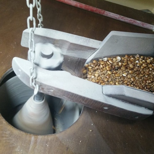Detail of part of the cereal grinding for making gofio