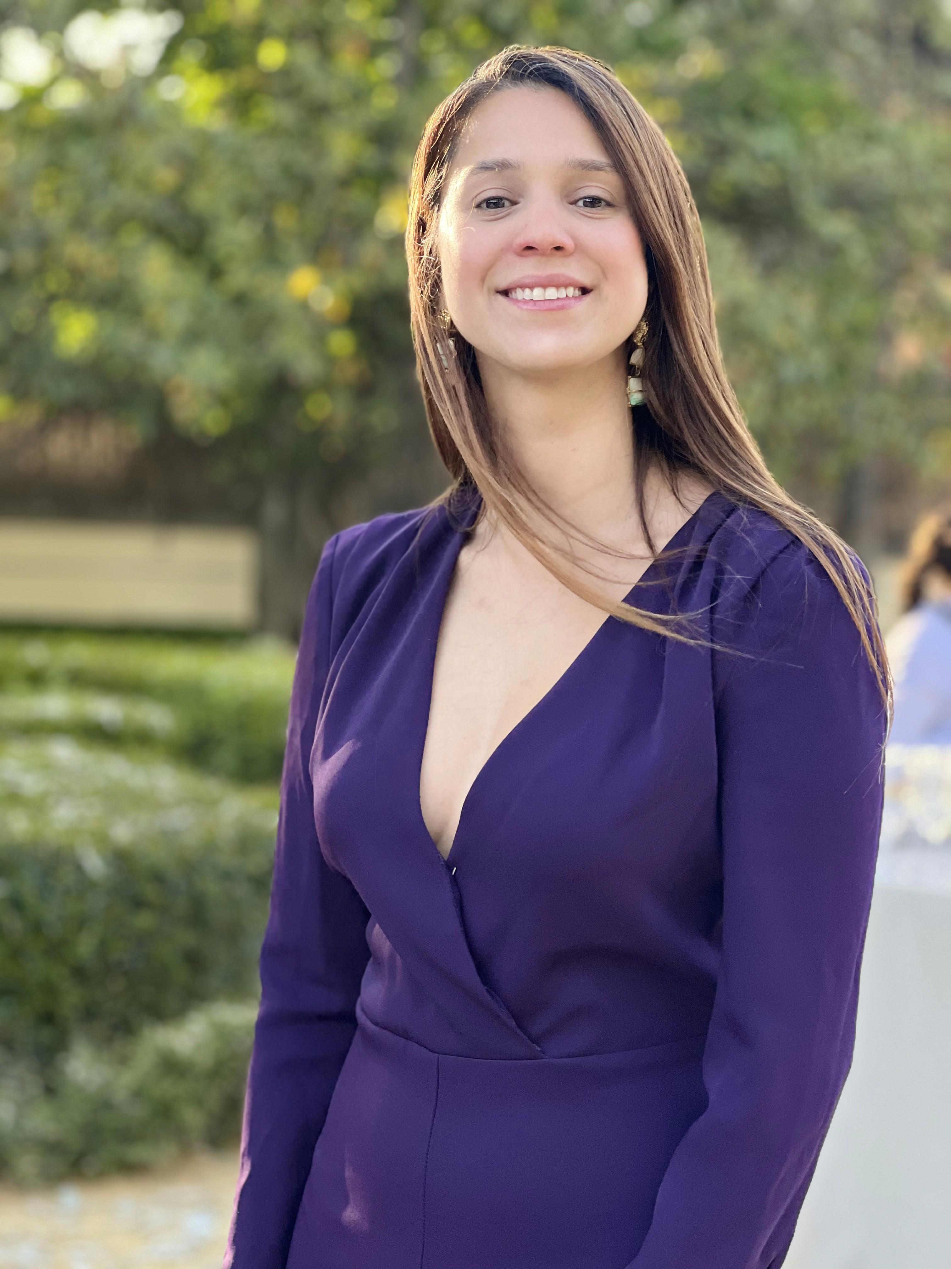 a blurry photo of a person standing in front of a wall