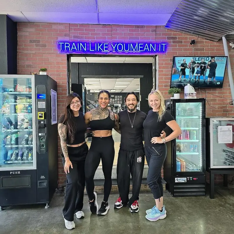 Big Tex Gym team members welcoming new visitors at Big Tex Gym, Austin TX