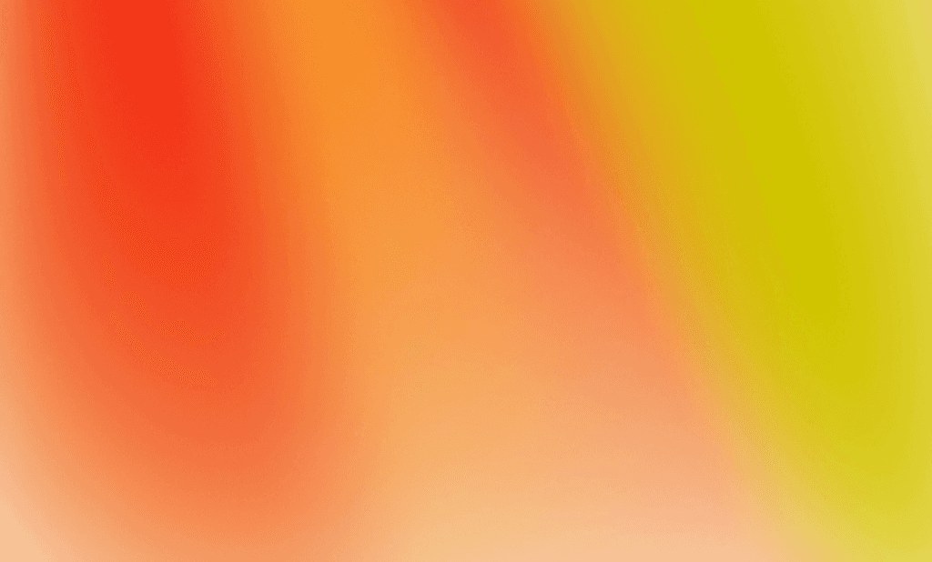 Abstract gradient of red, orange, and yellow colors.