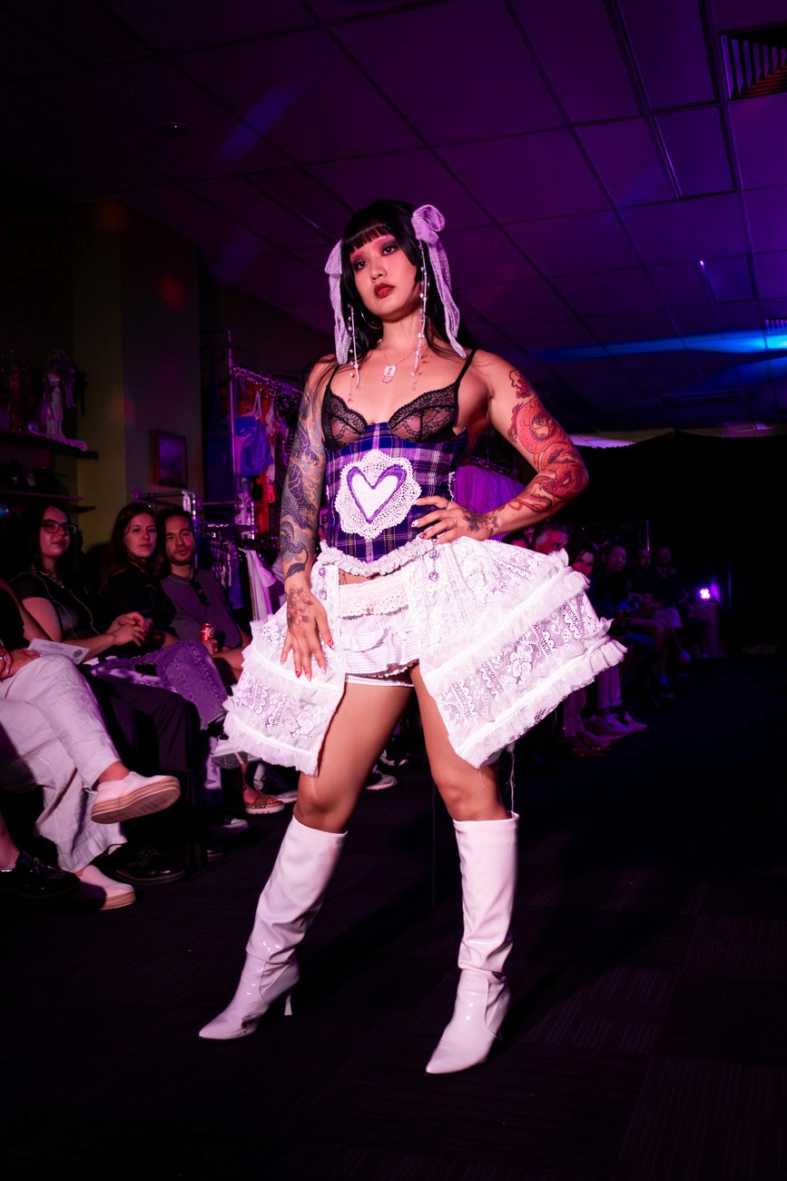 female model on runway wearing lace and frills