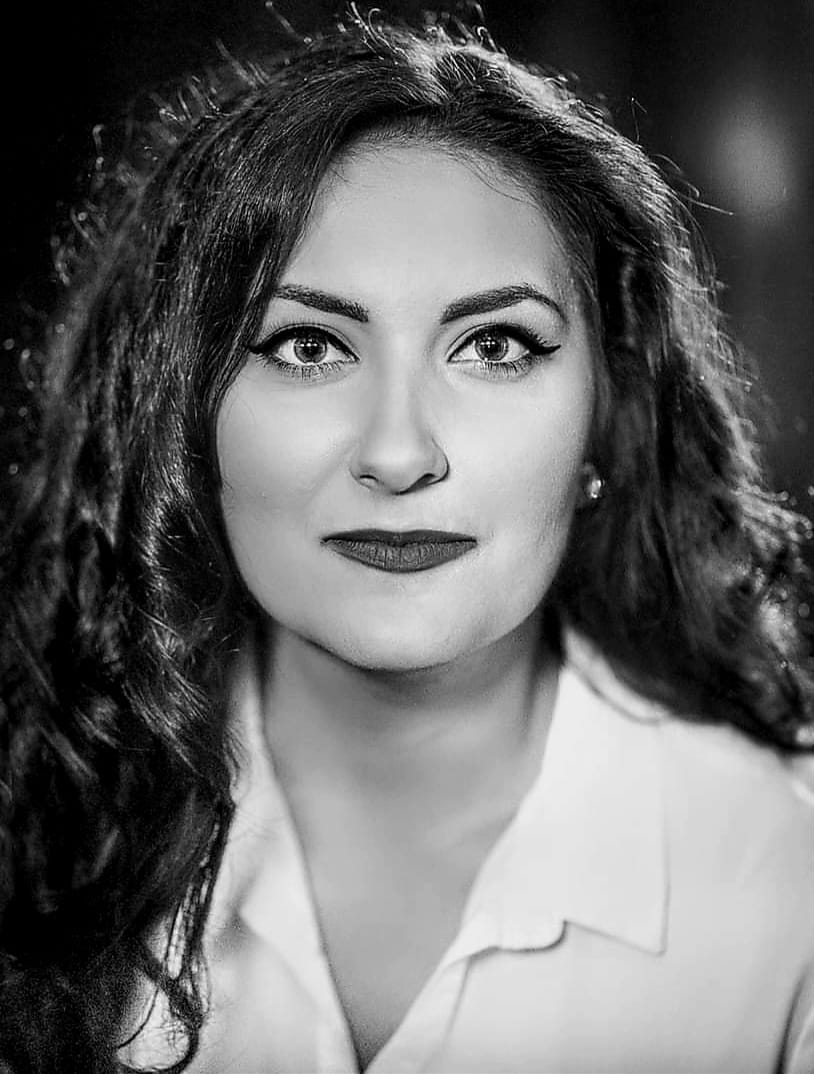 female photographer with red hair