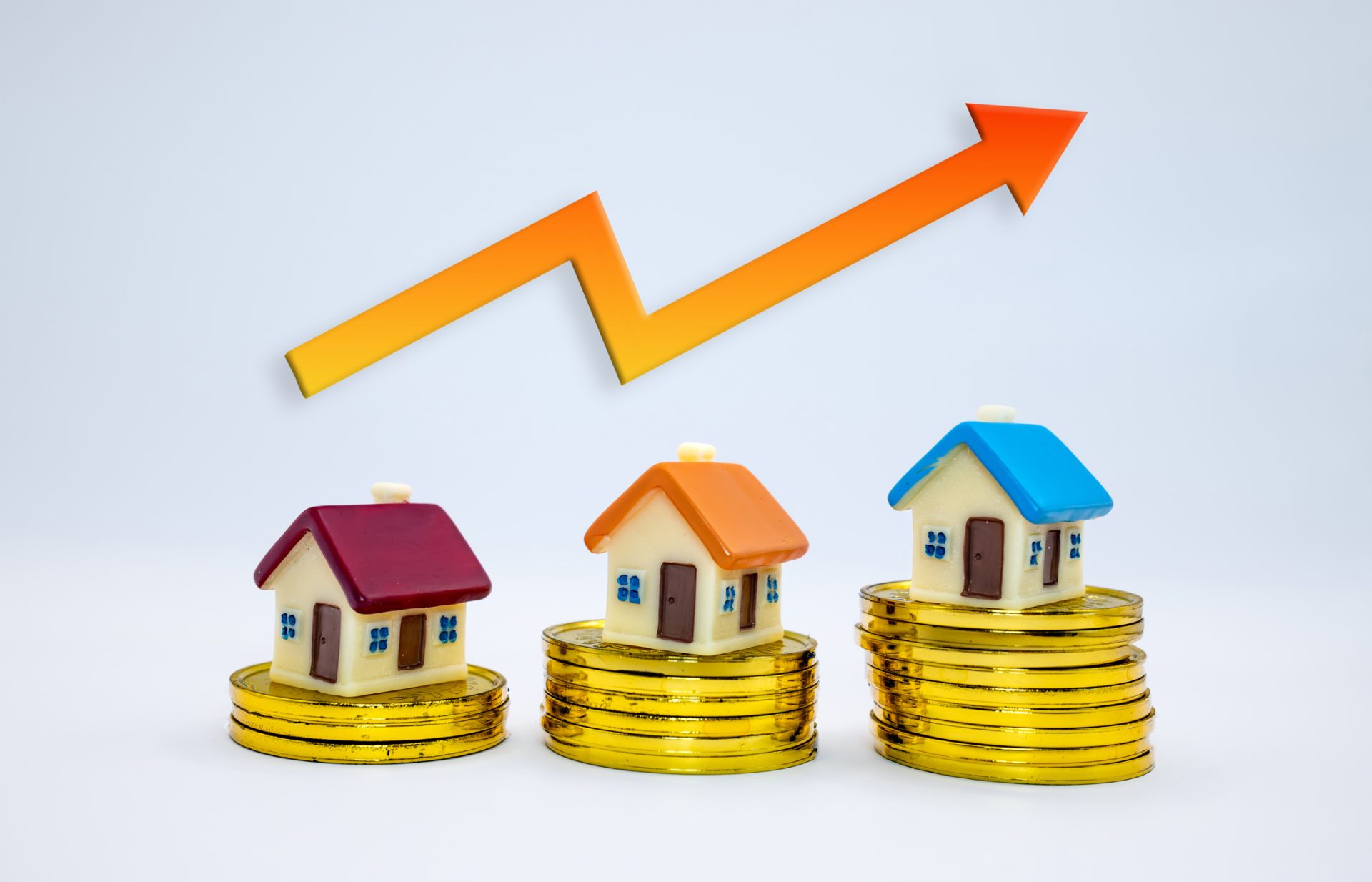 Miniature houses on coins with an increasing graph