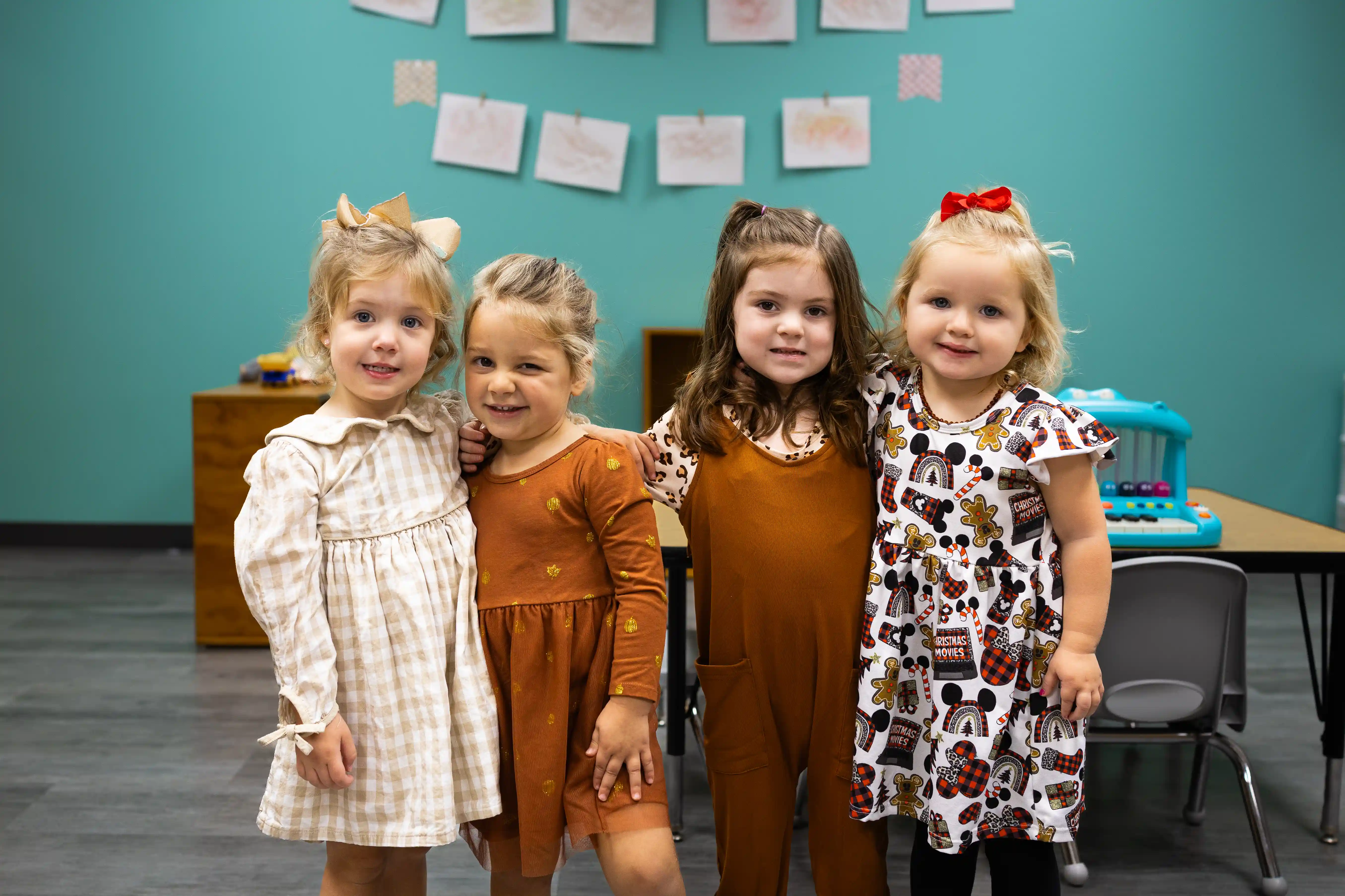 Toddler girls smiling during class