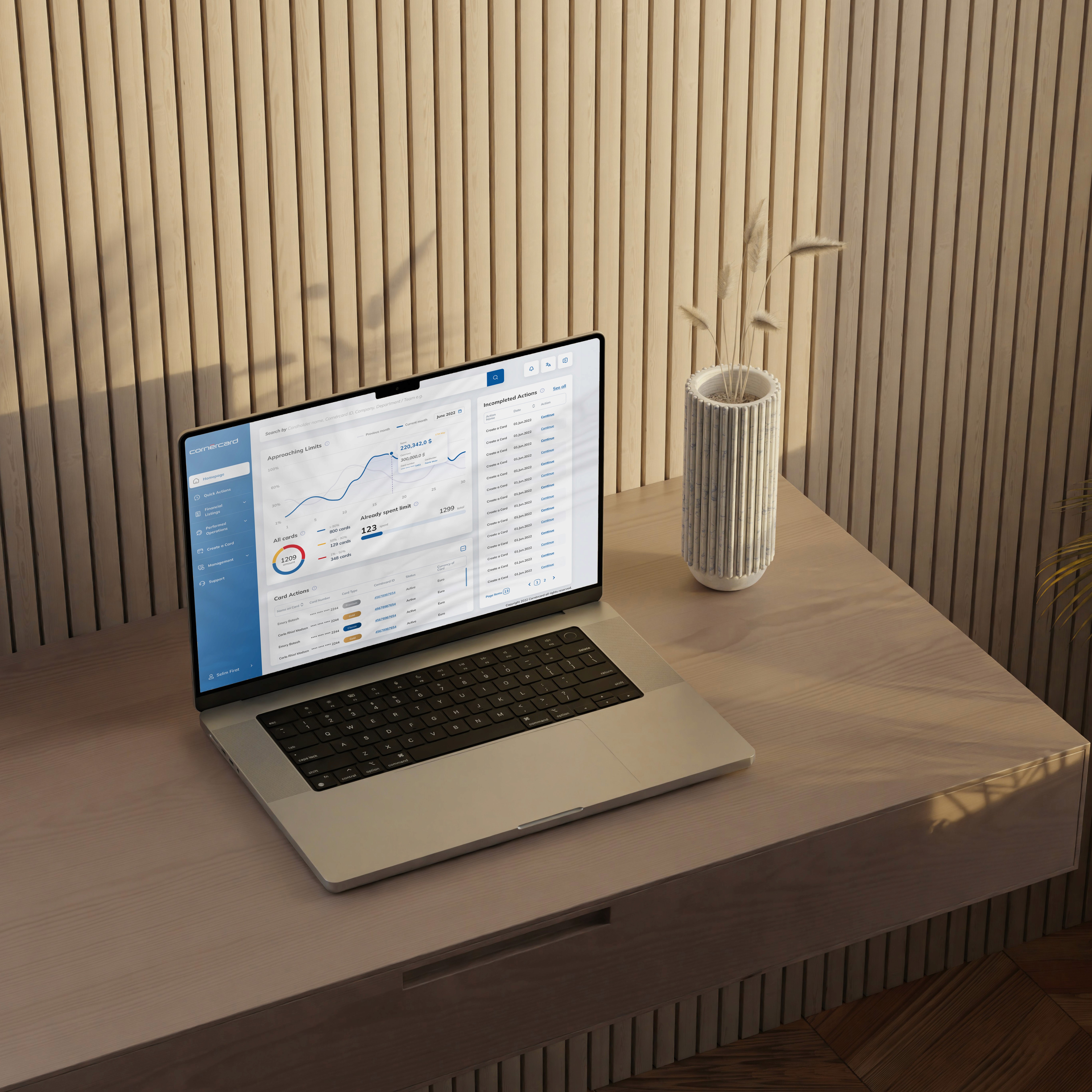 A mockup for a Macbook placed on a table for a hair salon website