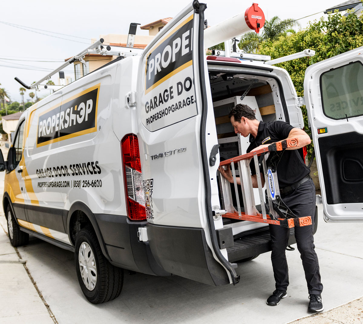 man standing in front of open doorway
