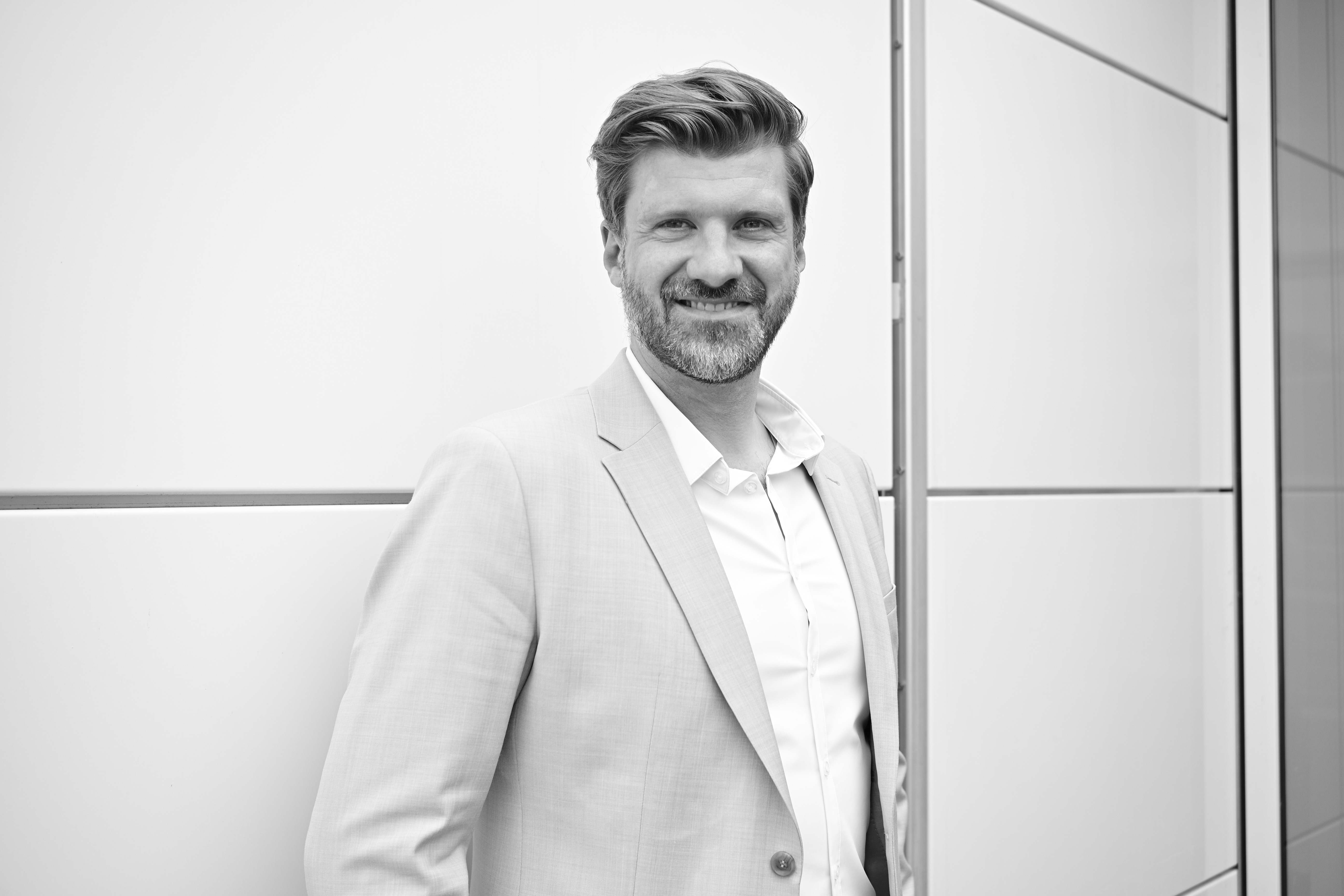 person sitting in a chair in front of a man