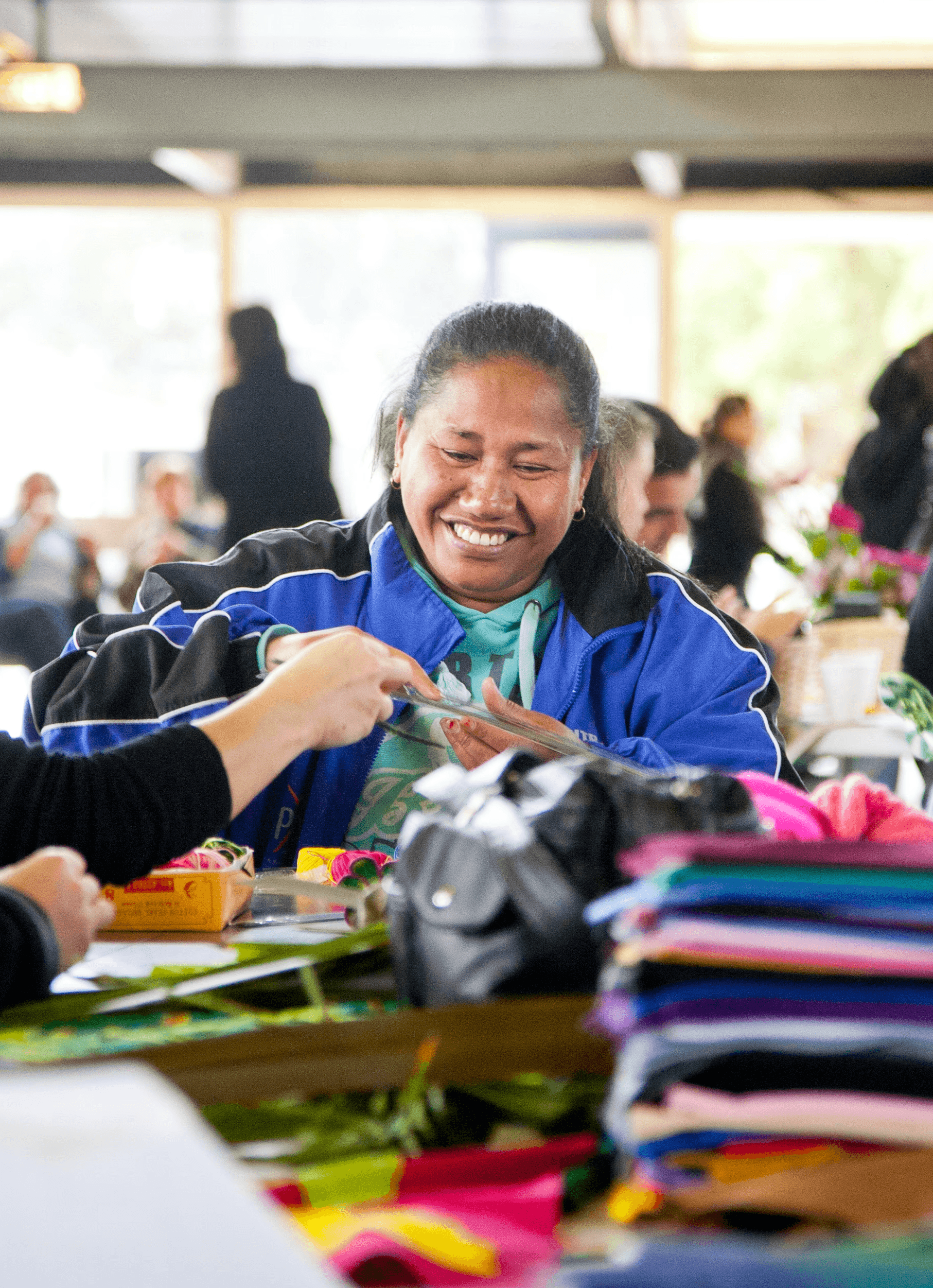 four person holding each others waist at daytime
