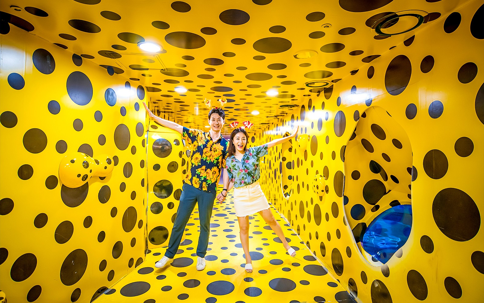 Visitors enjoying a polka dot room at SEA LIFE Busan Aquarium.
