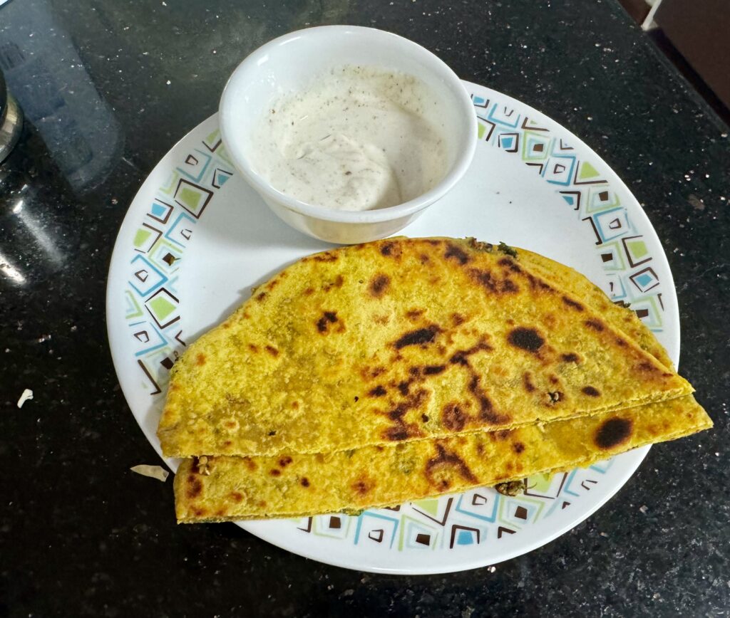 Thecha paratha served with a side of  sweet and spicy curd