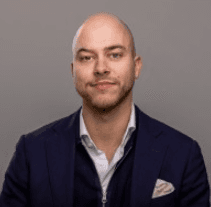 Young man in baseball caps wearing glasses