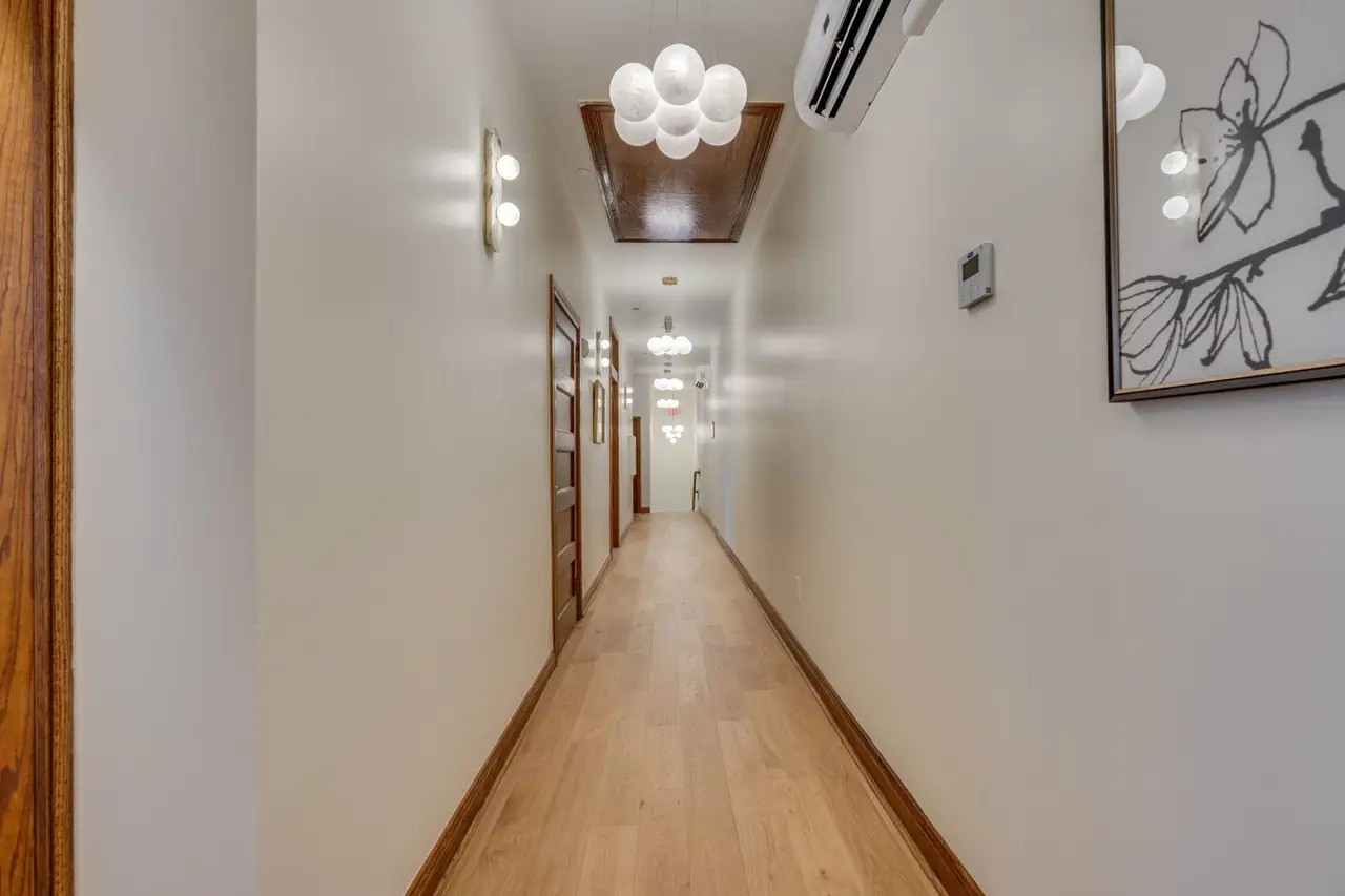 The downtown post hotel wood trim and floor hallway
