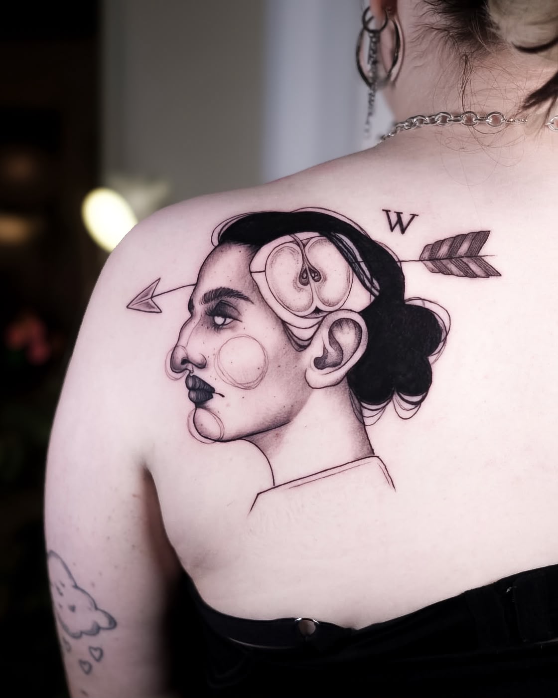 Playful Graphic Linework Fairy Tattoo by Artist Sandra