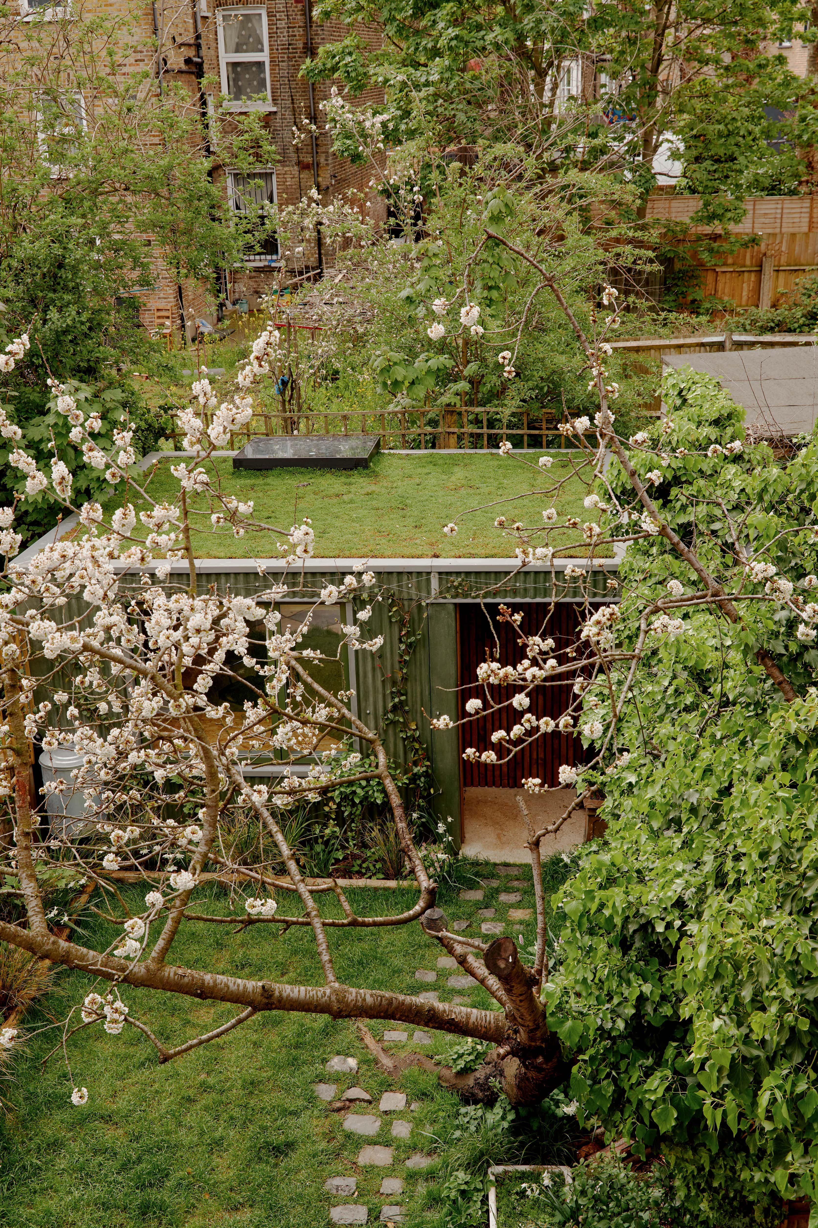 Portrait view of gardens with green roof