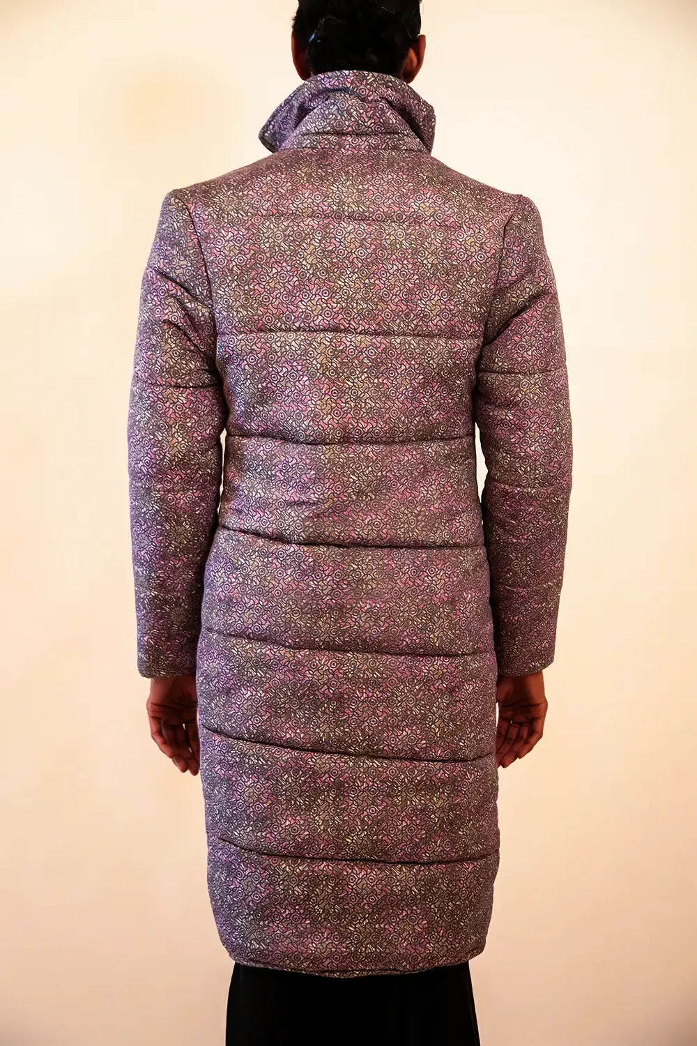 Agni is our one-of-a-kind printed silk puffer jacket, handcrafted by skilled artisans in-house using a one-of-a-kind vintage silk saree.