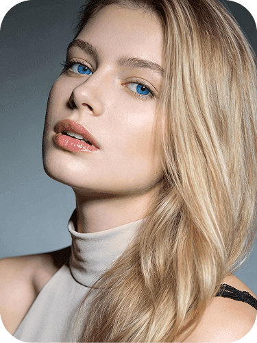 Minimal beauty portrait of a woman, natural makeup and soft studio lighting