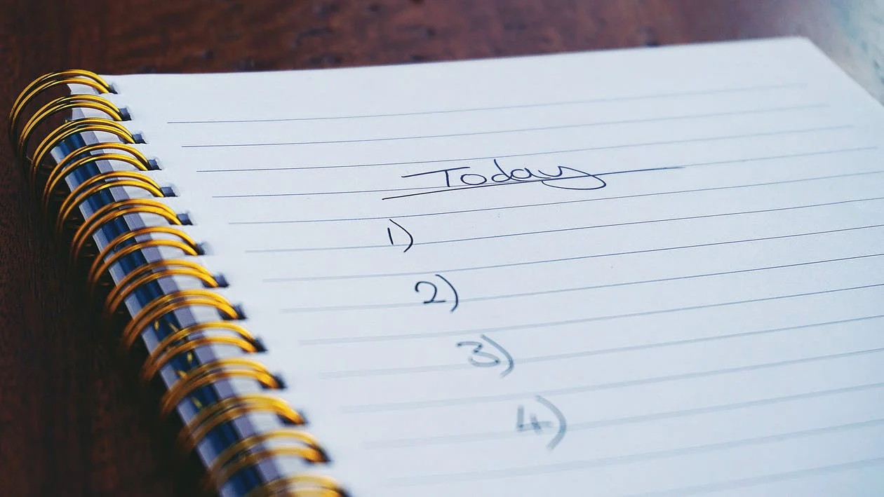 An image showing a notebook with the title today with 4 bullet points