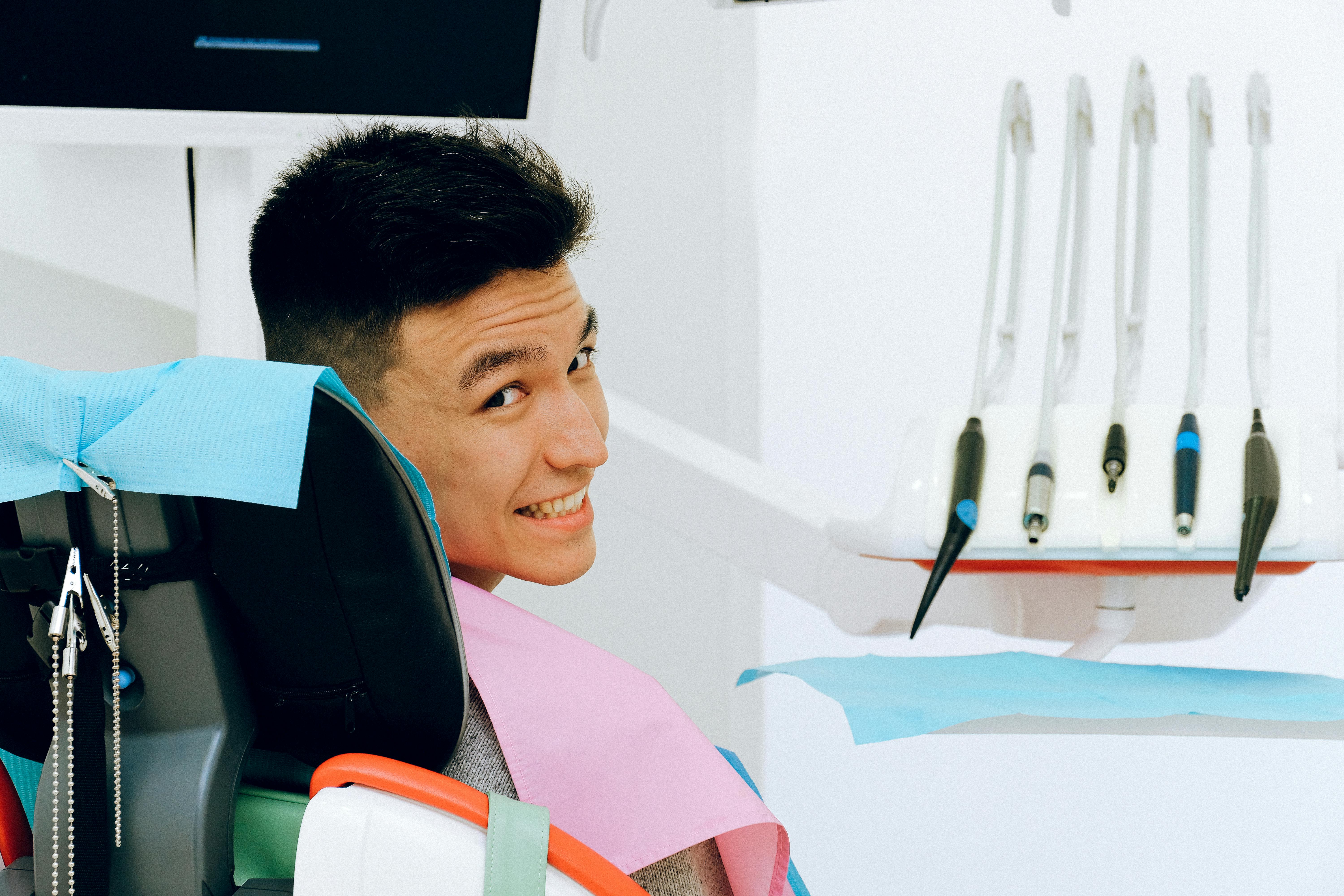 a picture of a person smiling in dentistry