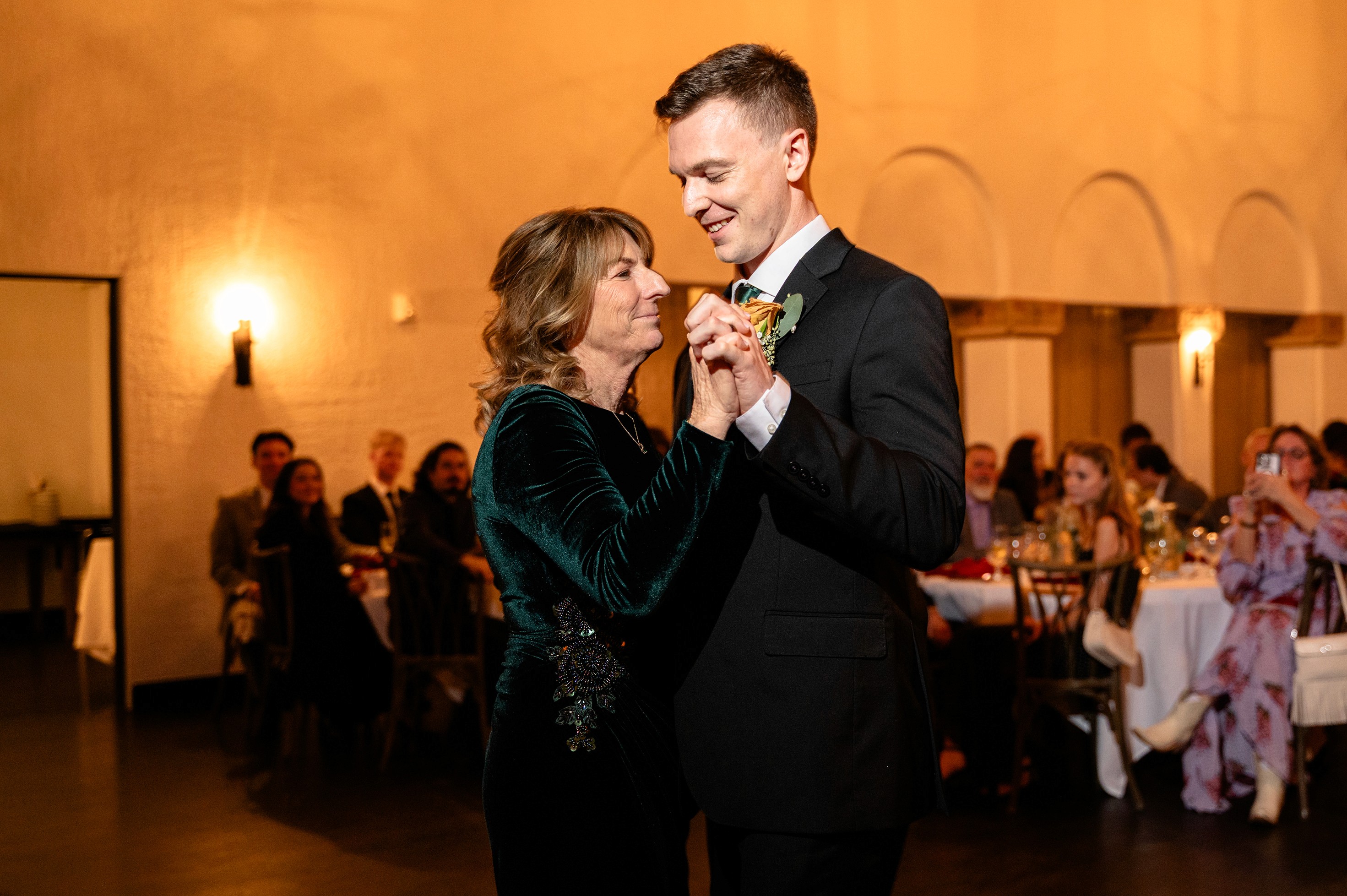 Flat lay wedding details with bouquet, rings, and sparkling bridal heels