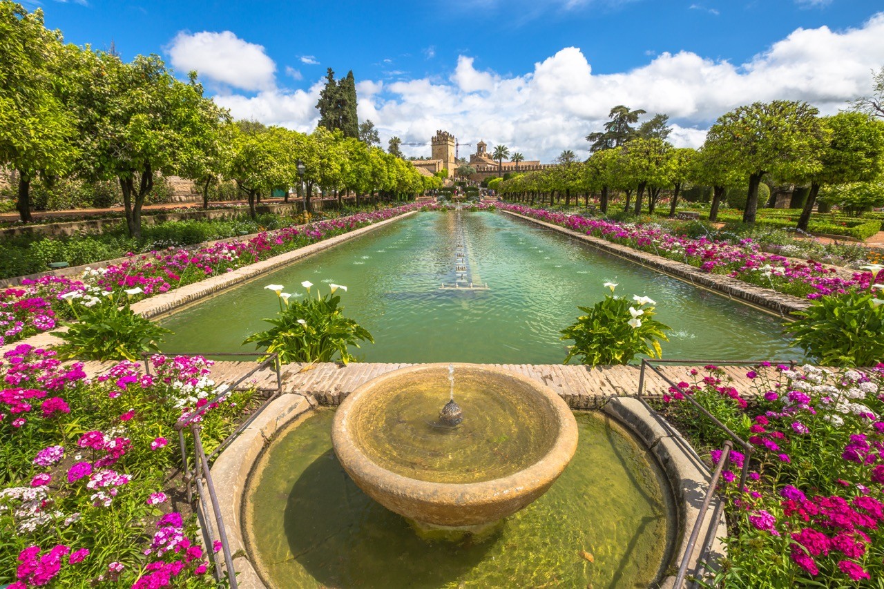 Fountain and gardens at Alcazar Cordoba's Royal Baths of Doña Leonor.