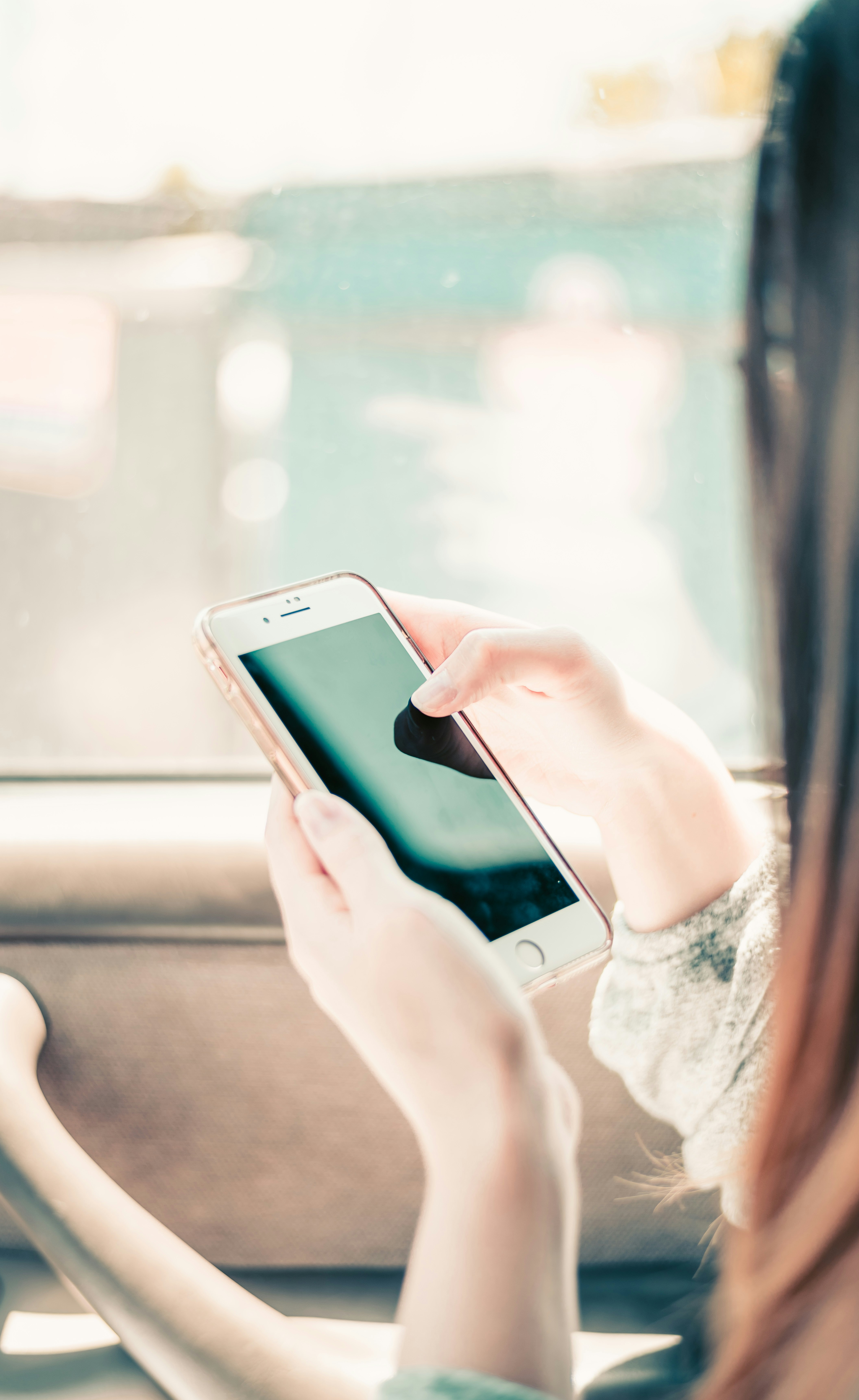 Women using white smartphone