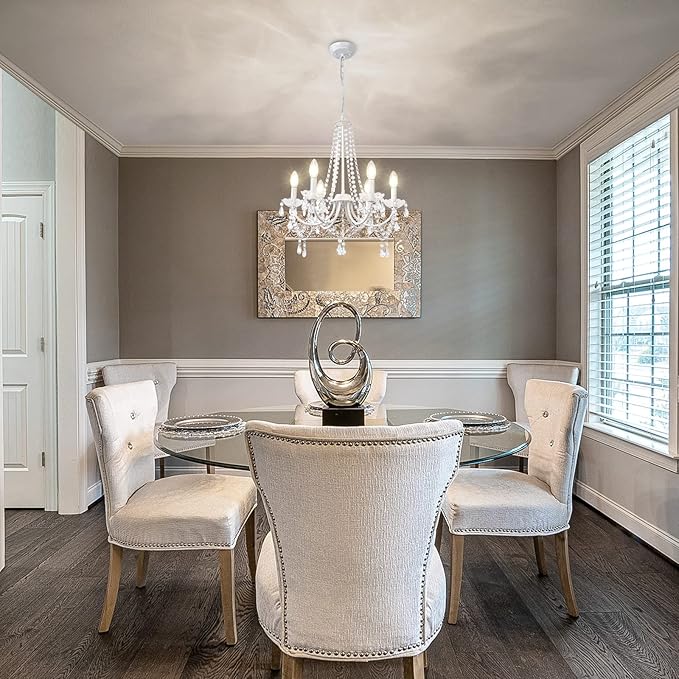 Chandelier white enhances the room with its unique design.