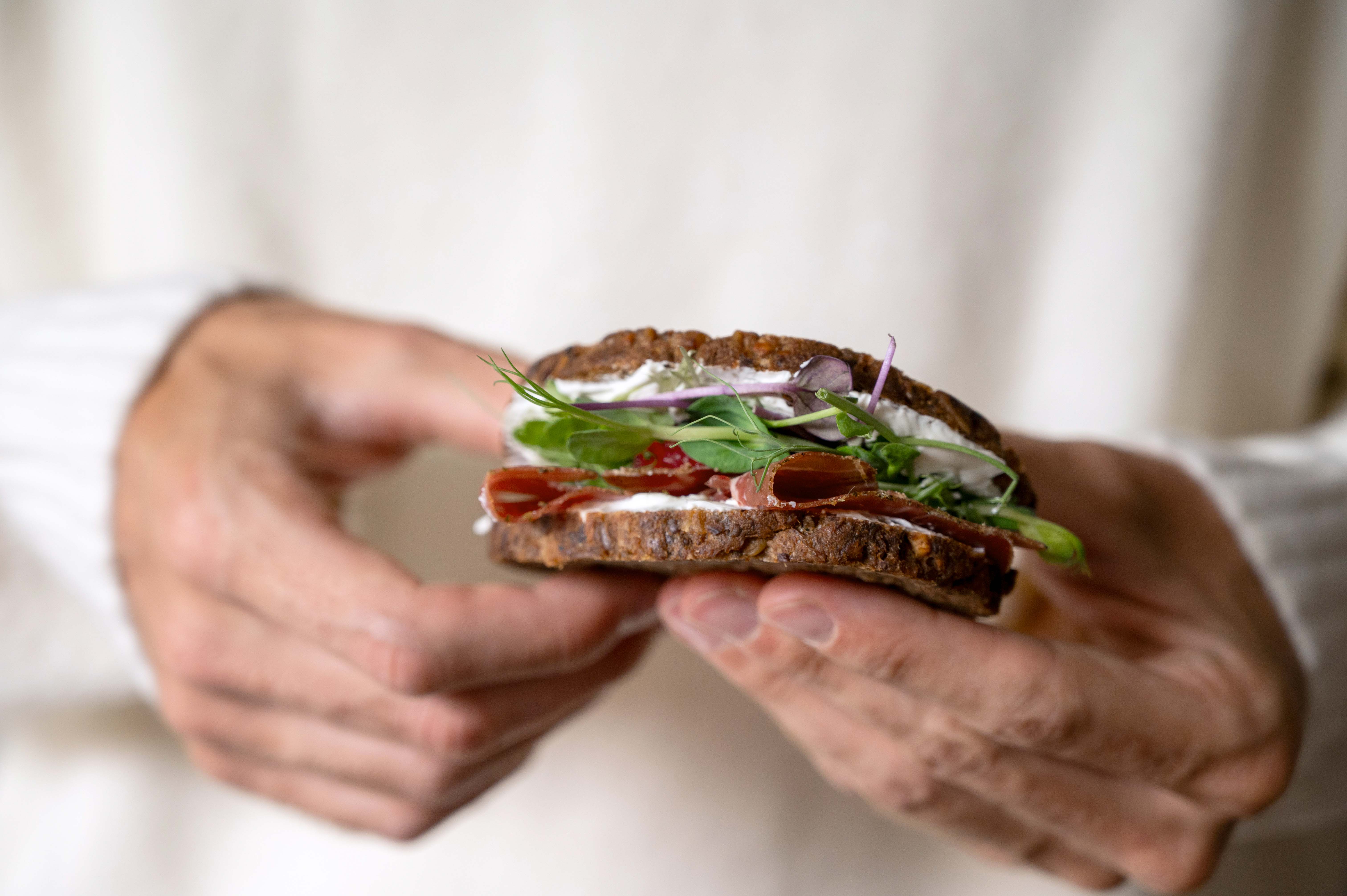 woman walking on pathway during daytime