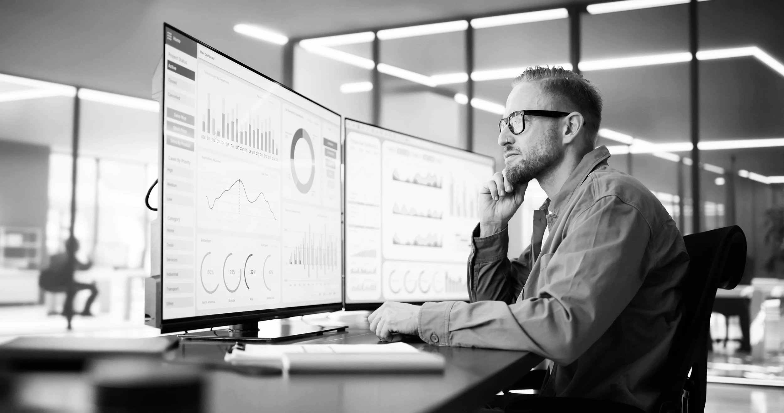 Woman holding a smartphone looking through the glass 