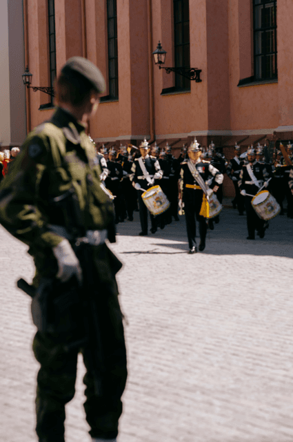 Watching the swedish royal guard march through the streets in stockholm