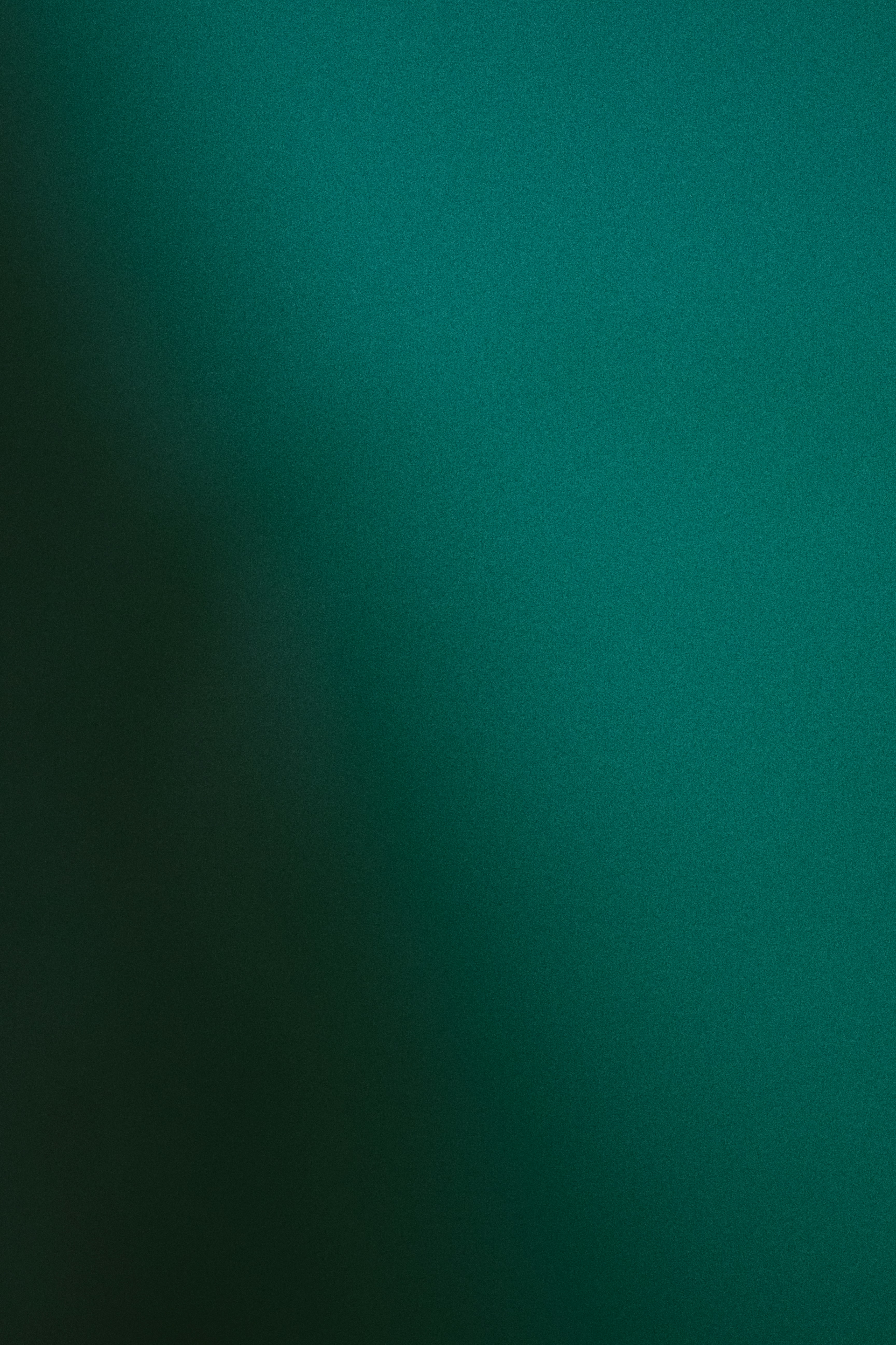 Dark teal and green gradient background