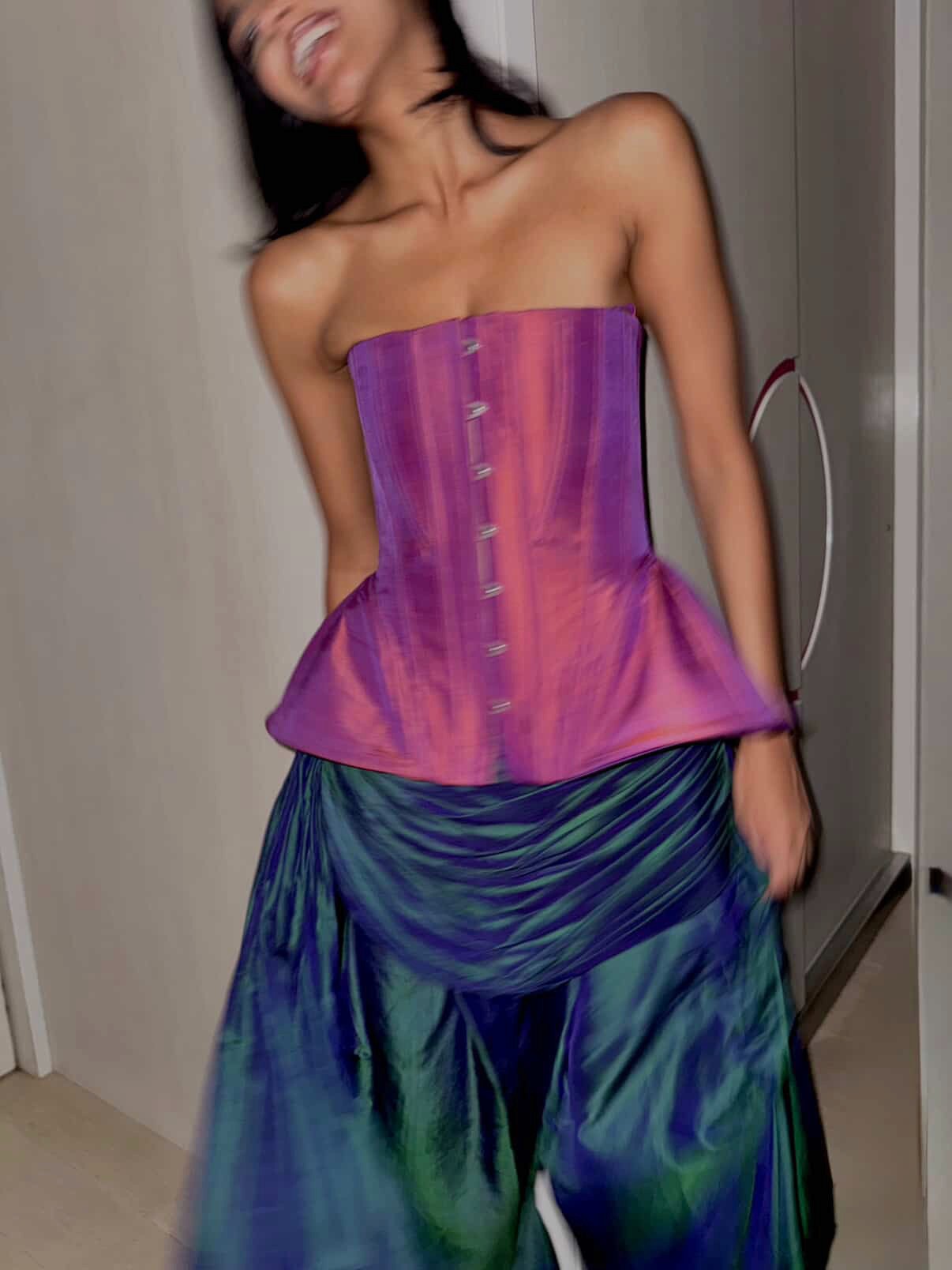 Kamal is a one-of-a-kind bell corset and skirt, handcrafted by skilled artisans in-house using a vintage emerald green silk saree. 