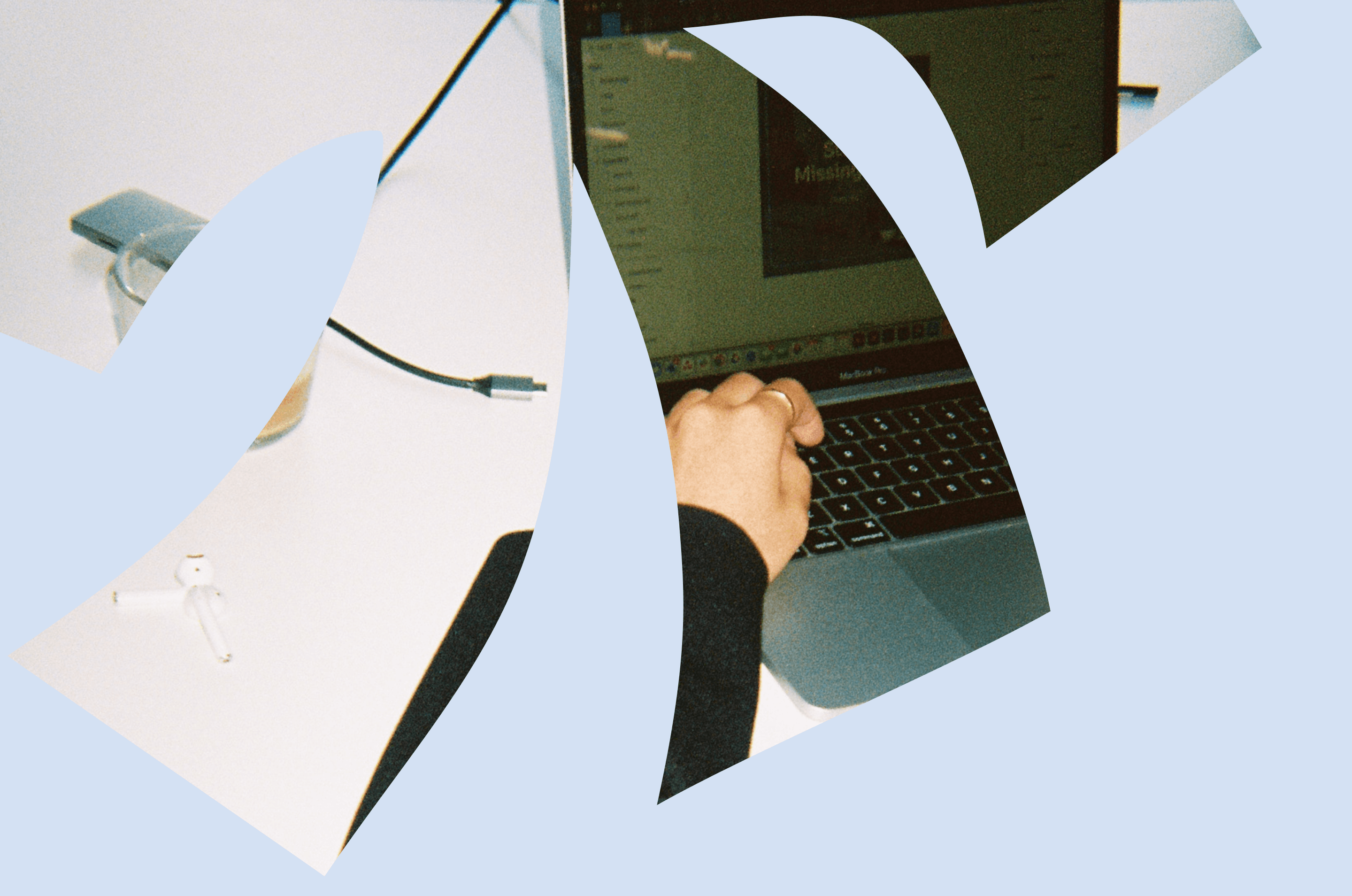 Person typing on MacBook laptop at desk, symbolizing geofencing marketing that captures B2B leads at events, trade shows, and ABM campaigns in 2026