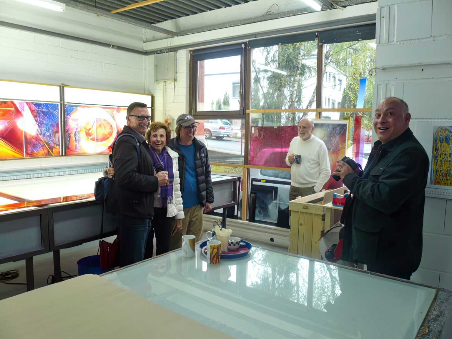 Franciscan Renewal Center guests just arriving at Derix Glasstudios to view their stained glass windows