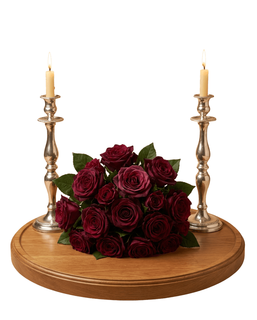 A woman sits cross-legged with eyes closed, wearing a white blouse and a long purple skirt, looking serene.