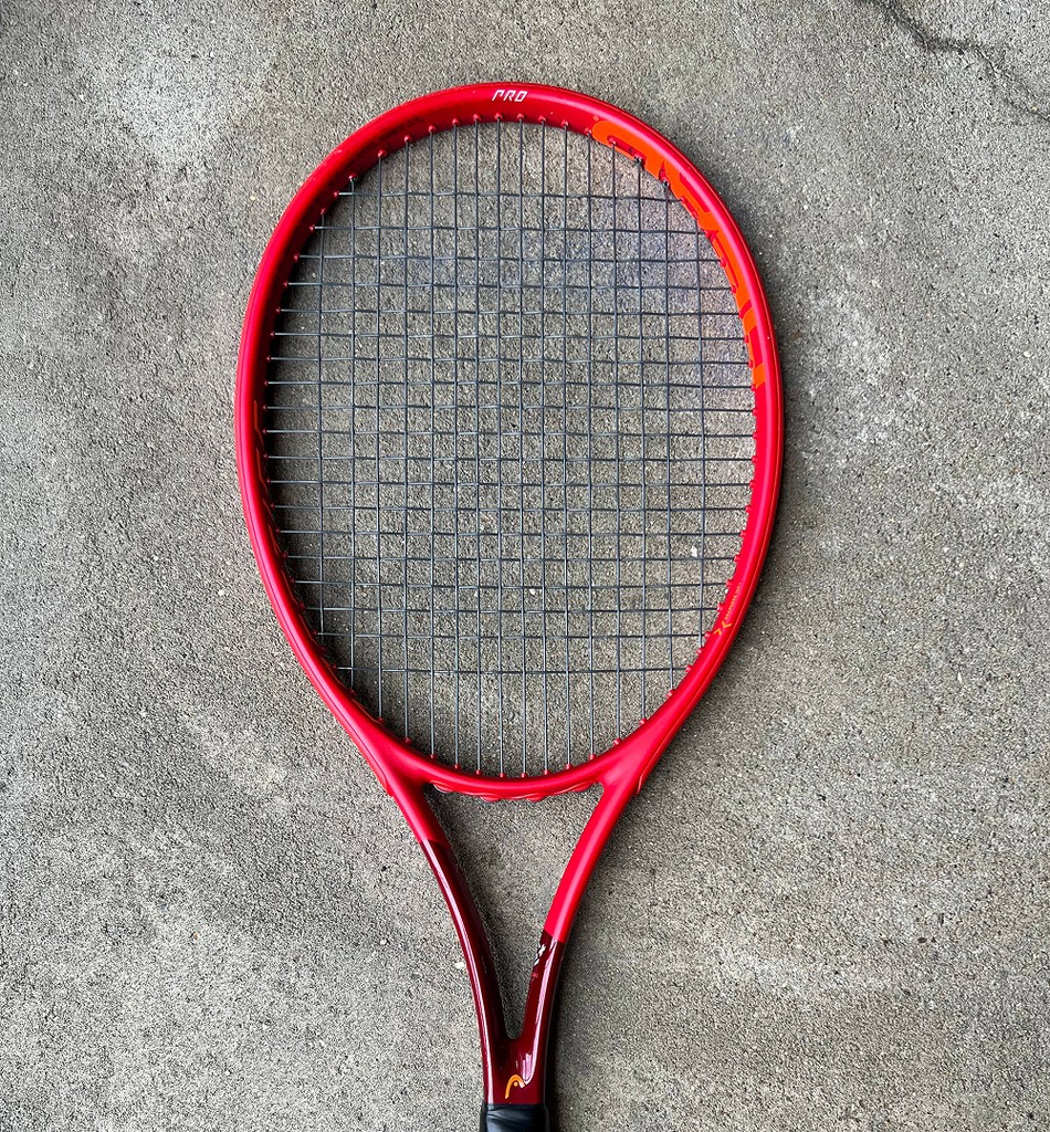 Hackney Tennis Stringer - This is a Head Prestige pro, red, used as background for the Hackney Tennis Stringer website