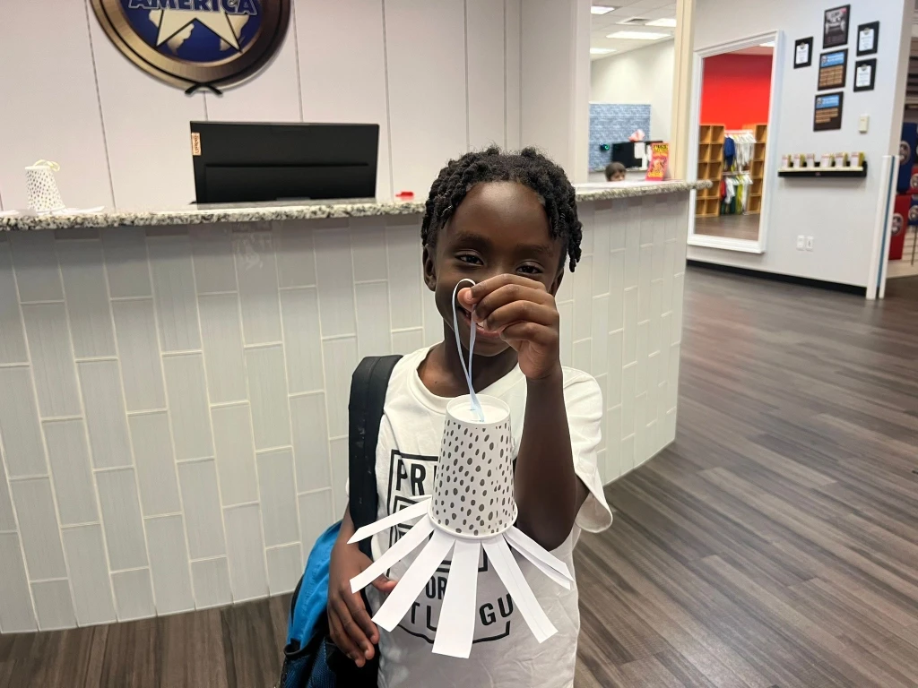 Two boys playing video games.