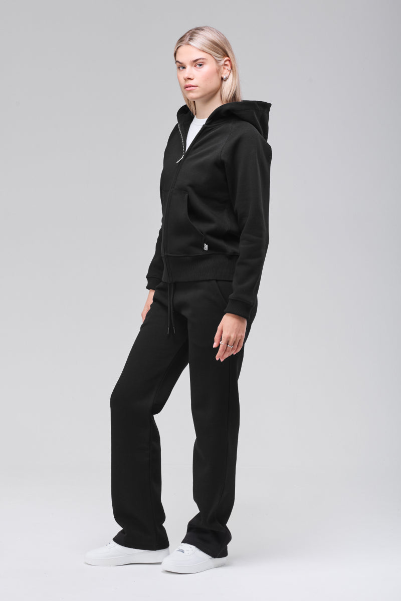 Side view, black zip hoodie full figure