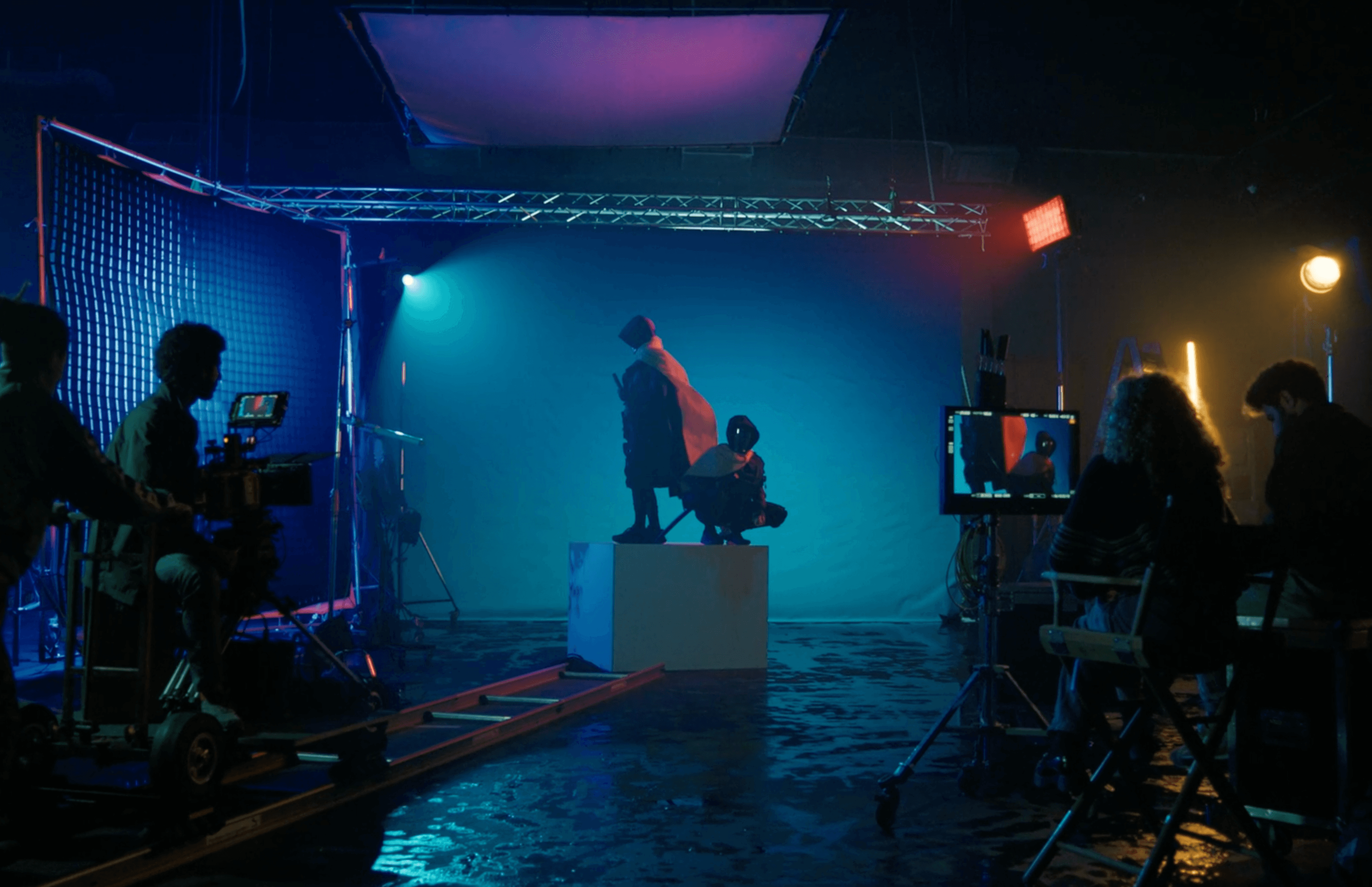 Video production crew on a cinematic film set — creating content for the Playhuman creator media network