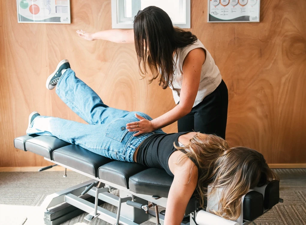 Women getting chiropractic adjustment