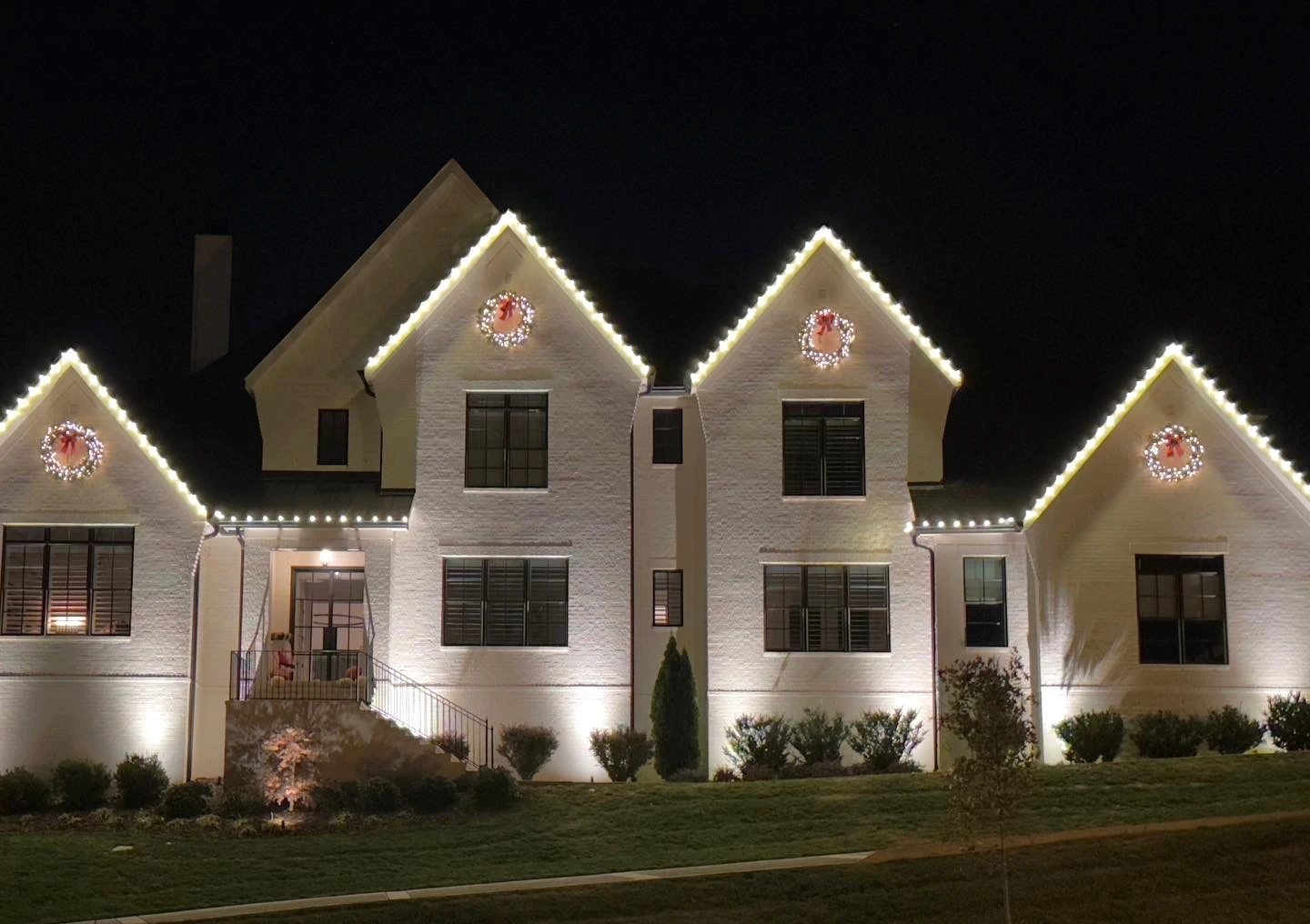 Nashville home with warm landscape lighting
