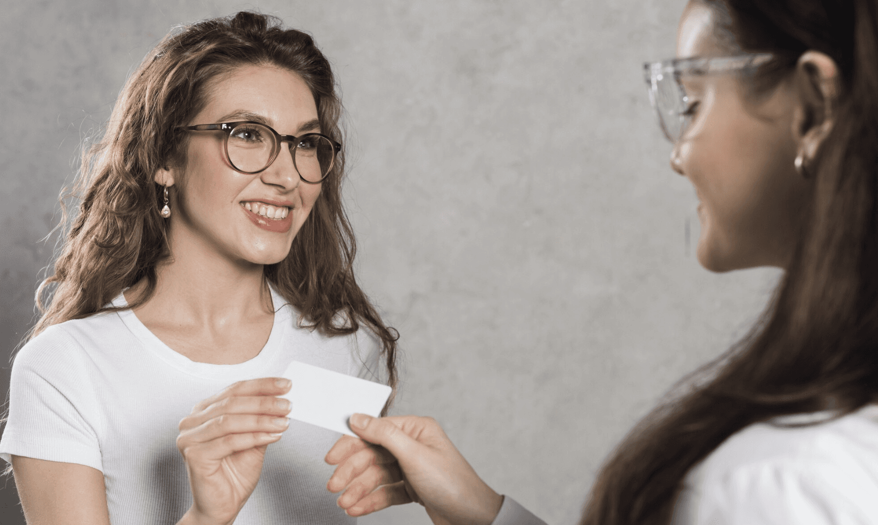 Two Women Practicing Program Manager Interview Questions