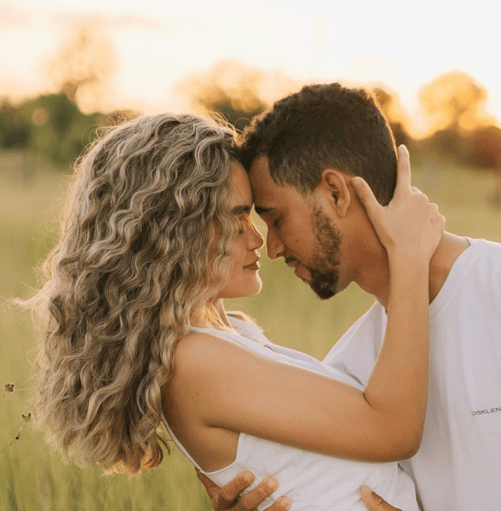 Couple embracing outdoors representing couples services