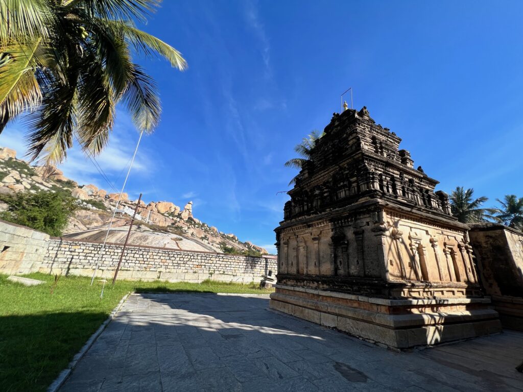 Avani betta is seen from the Ramalingeshwara temple. The temple gopuram is seen in the picture
