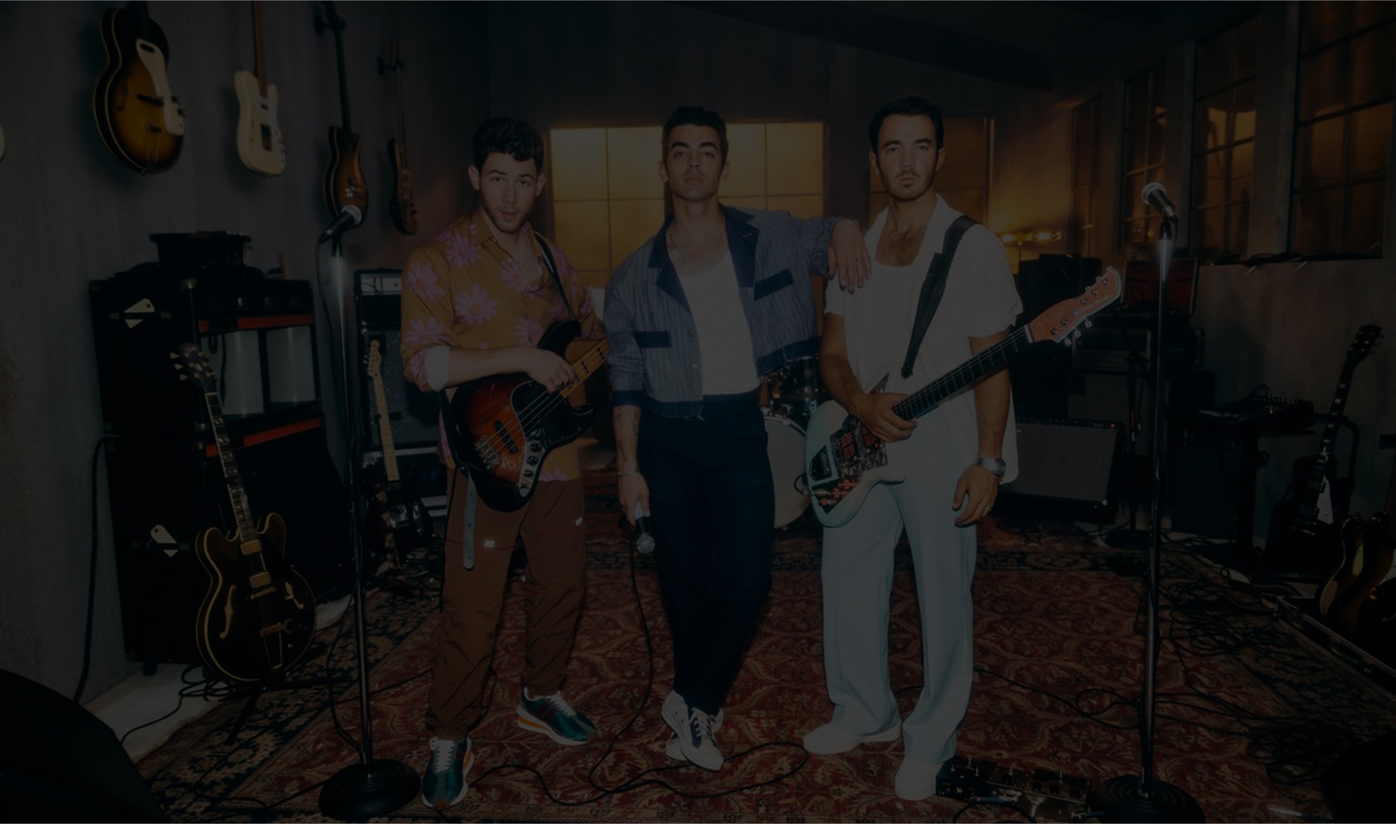 Background photo of the Jonas Brothers